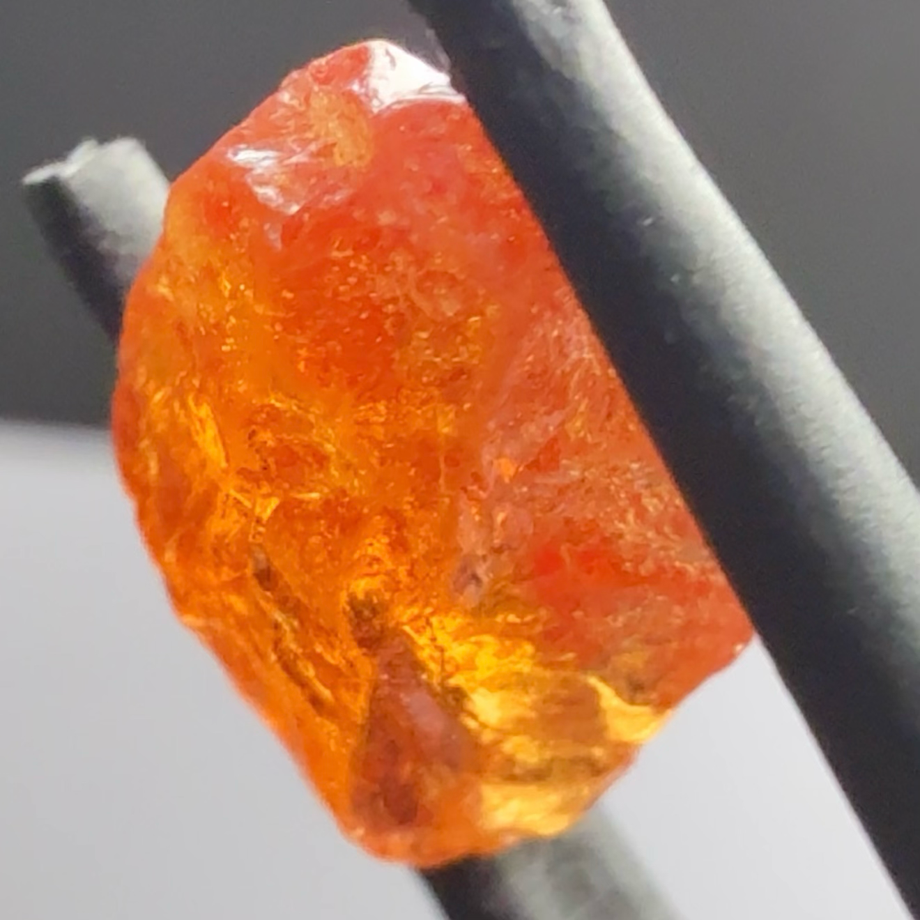Mandarin Carrot Colour Spessartite Garnet, 5.51ct, Loliondo, Tanzania. Untreated Unheated. Slight crack on outside coming 2mm into stone, rest very slight sugar