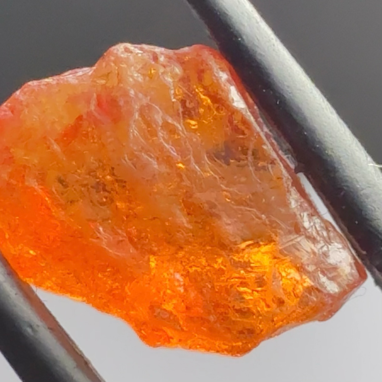Mandarin Carrot Colour Spessartite Garnet, 5.51ct, Loliondo, Tanzania. Untreated Unheated. Slight crack on outside coming 2mm into stone, rest very slight sugar