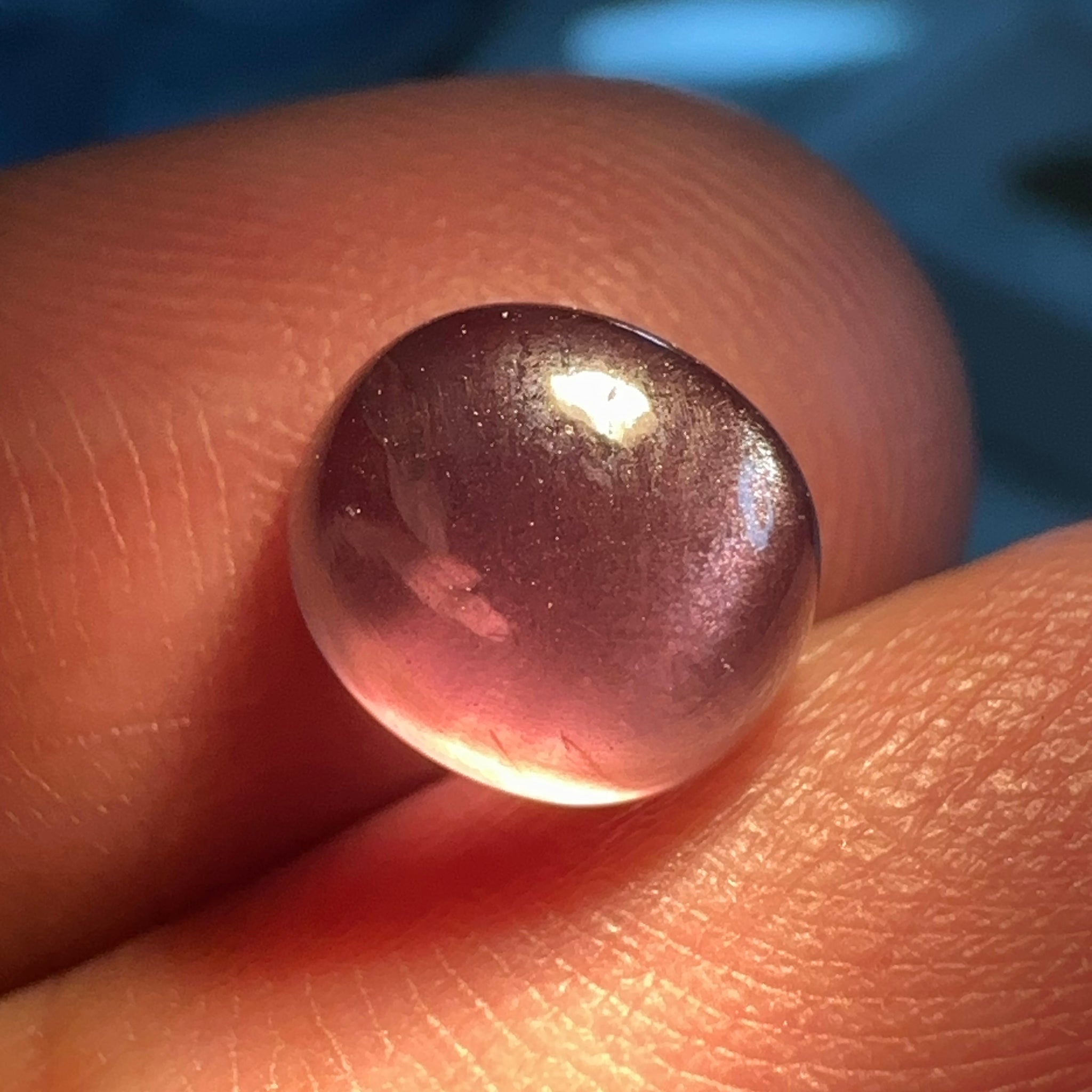 Colour Change Sapphire Cabochon, 3.52ct, Umba Valley, Tanzania. Untreated Unheated. Seems to have silk that appears as a moving spot
