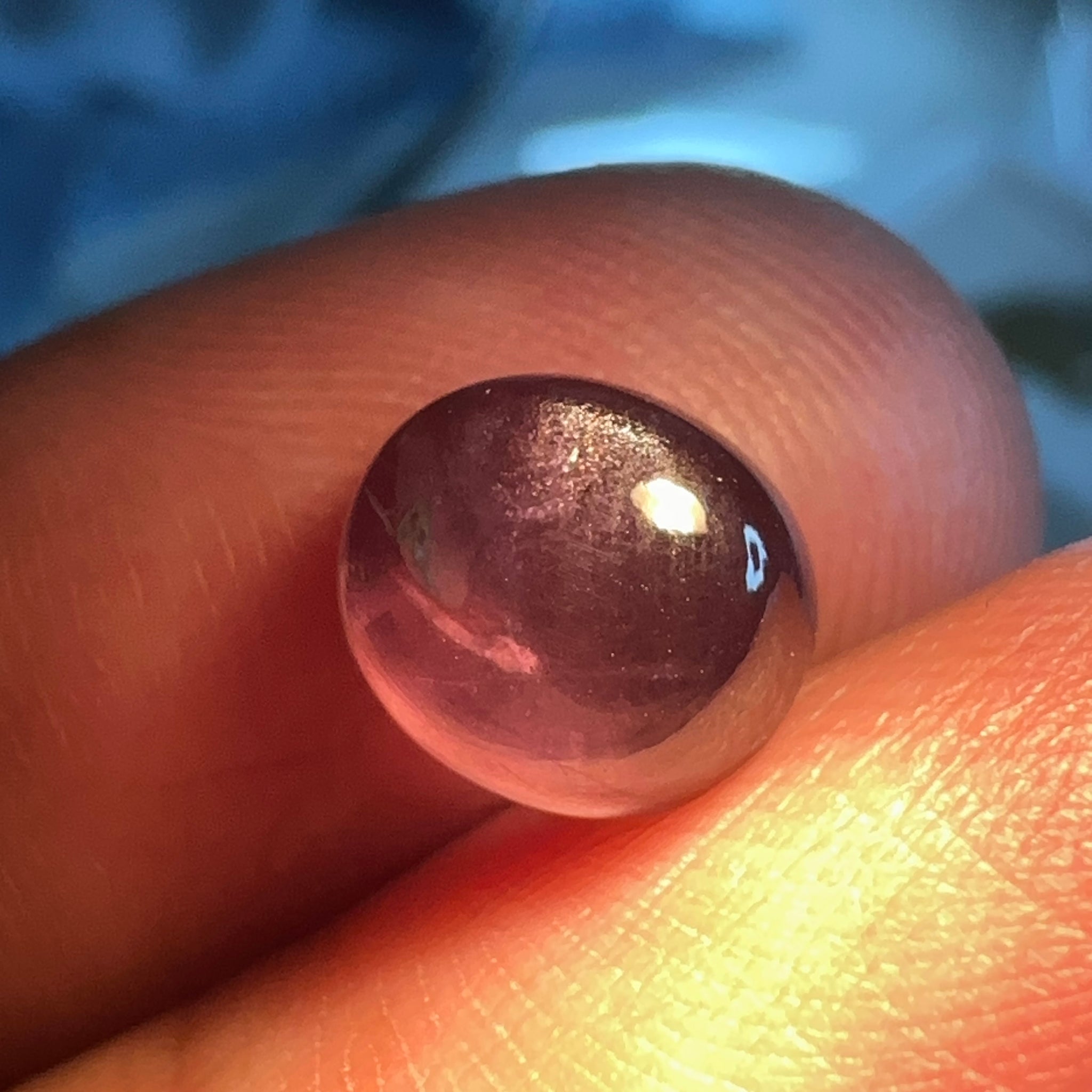 Colour Change Sapphire Cabochon, 3.52ct, Umba Valley, Tanzania. Untreated Unheated. Seems to have silk that appears as a moving spot