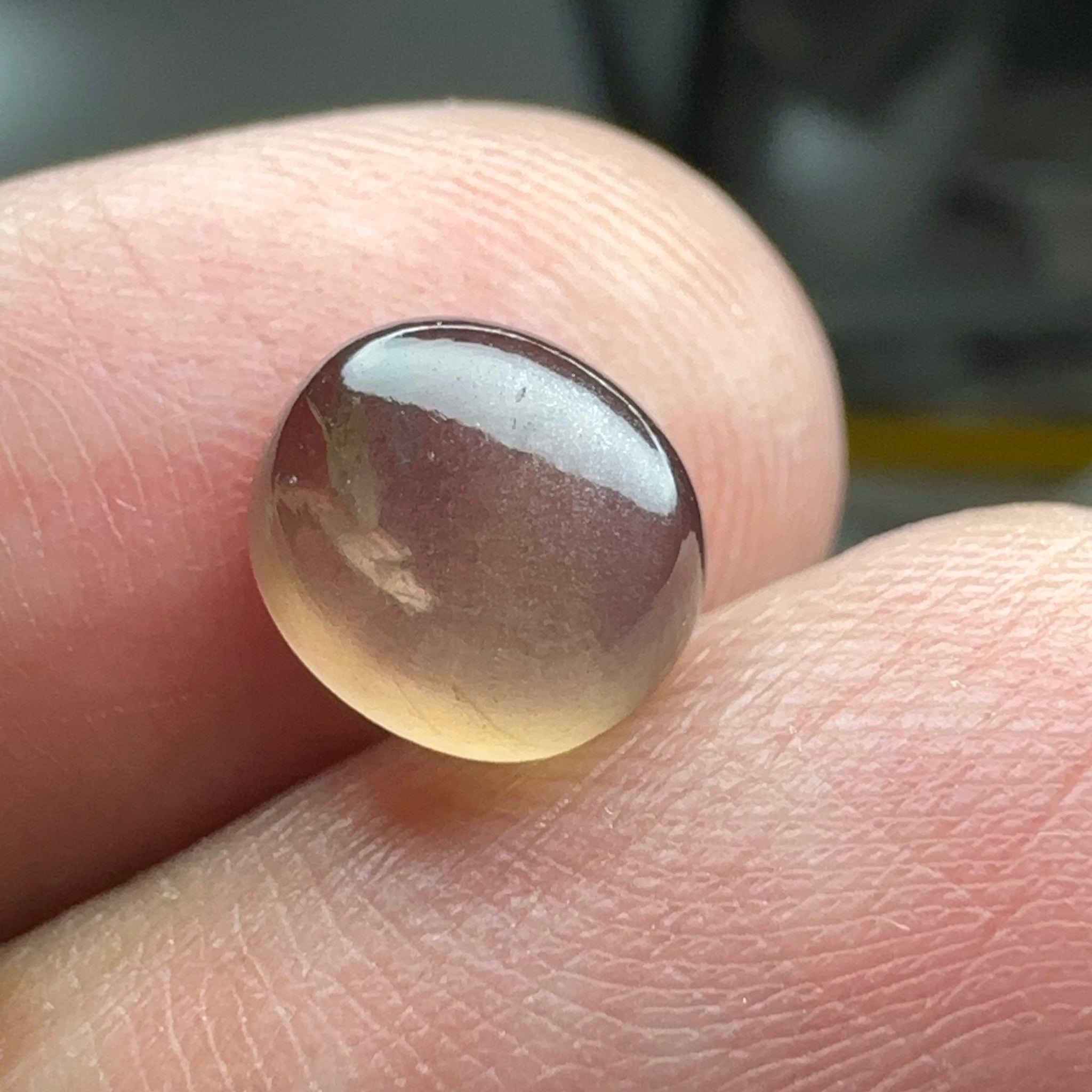 Colour Change Sapphire Cabochon, 3.52ct, Umba Valley, Tanzania. Untreated Unheated. Seems to have silk that appears as a moving spot