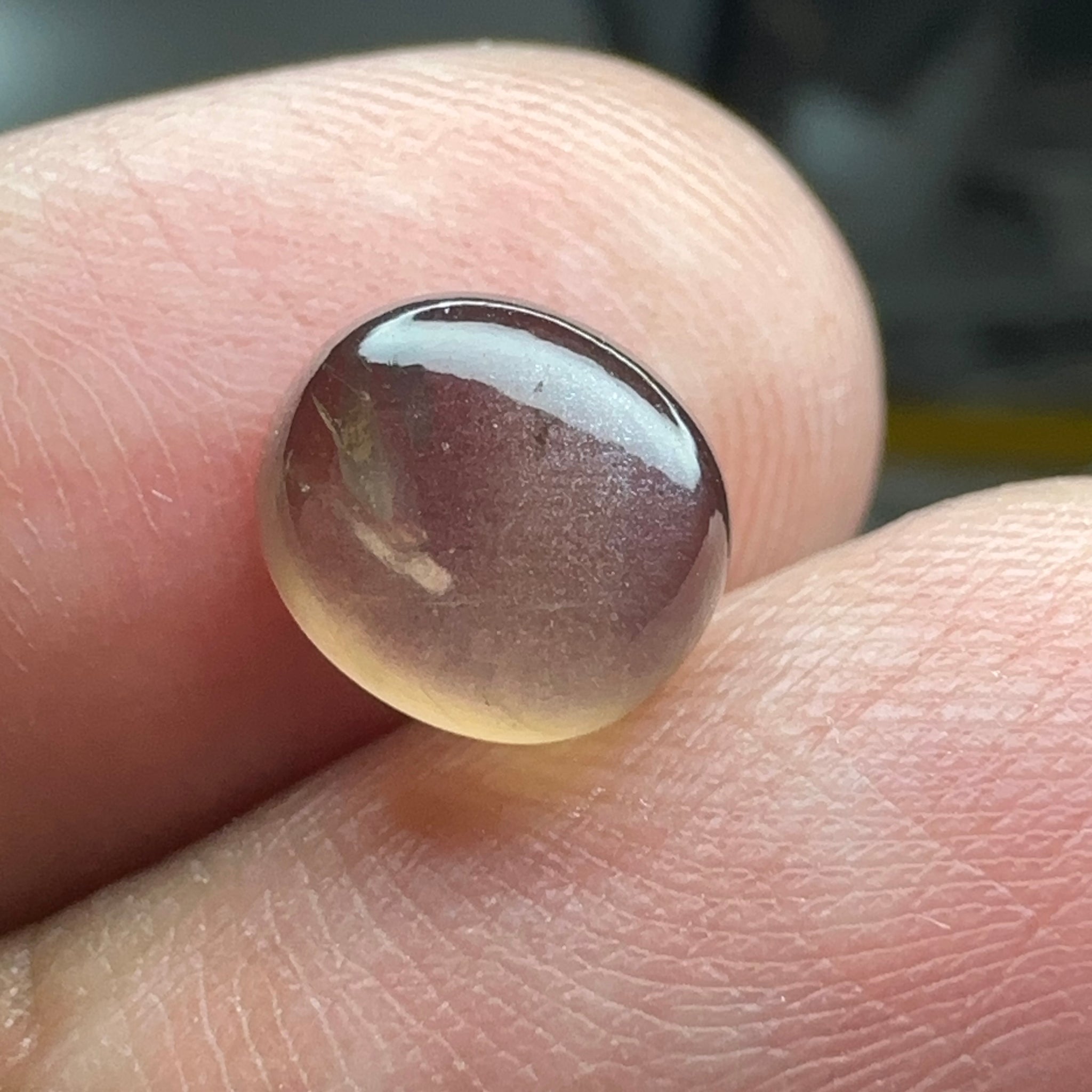 Colour Change Sapphire Cabochon, 3.52ct, Umba Valley, Tanzania. Untreated Unheated. Seems to have silk that appears as a moving spot