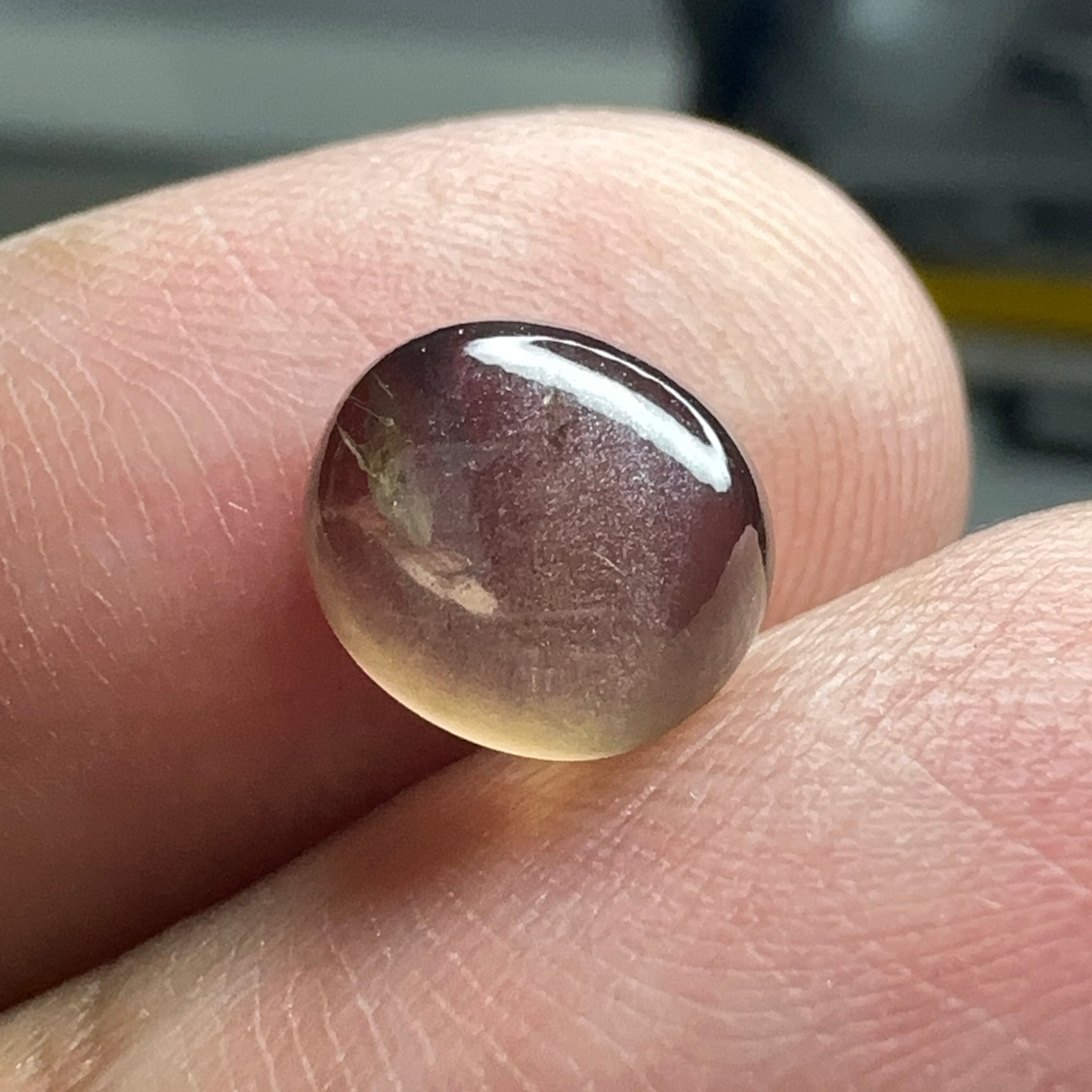 Colour Change Sapphire Cabochon, 3.52ct, Umba Valley, Tanzania. Untreated Unheated. Seems to have silk that appears as a moving spot