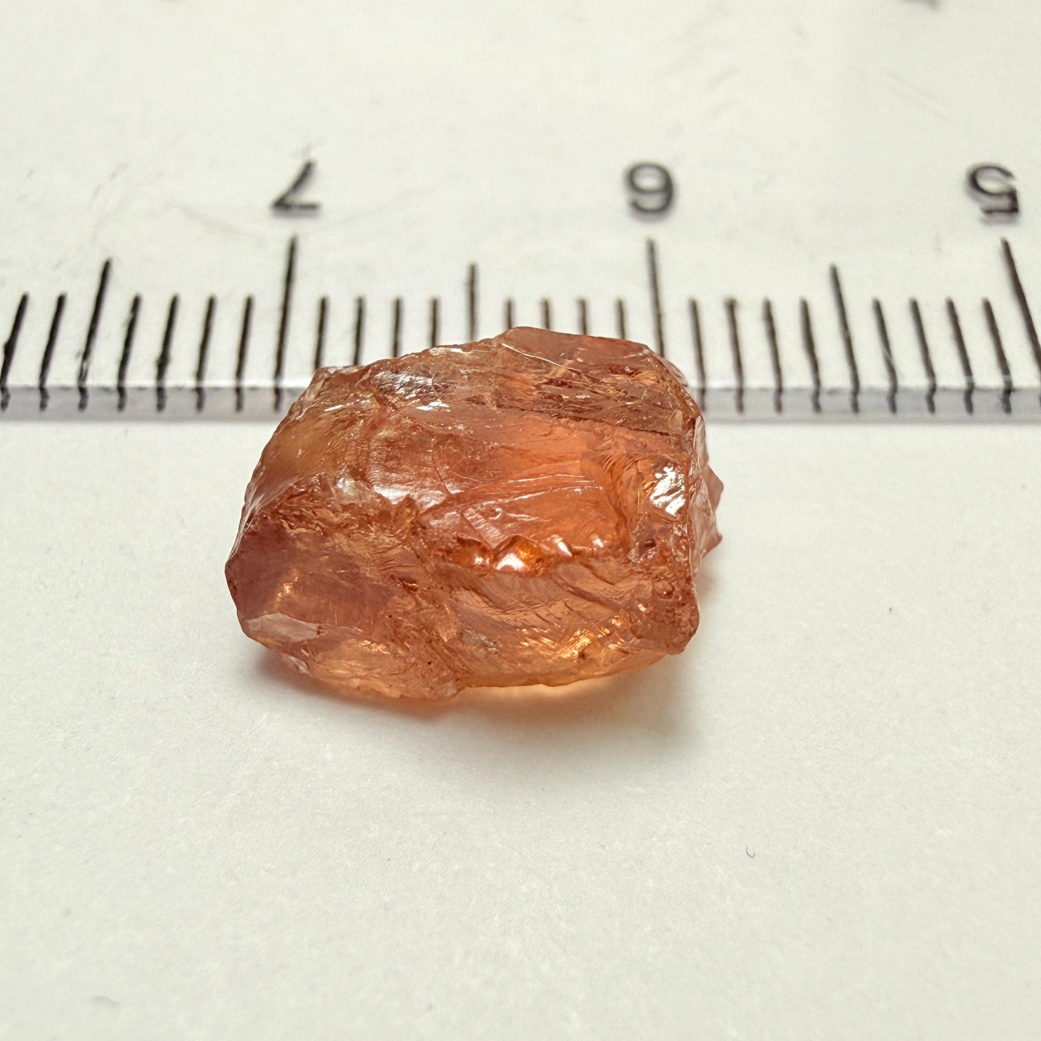 Peach Malaya Garnet, 5.97ct, vvs with 2 small spots on the outside, slight crack on skin, Unheated Untreated, Umba Valley Tanzania