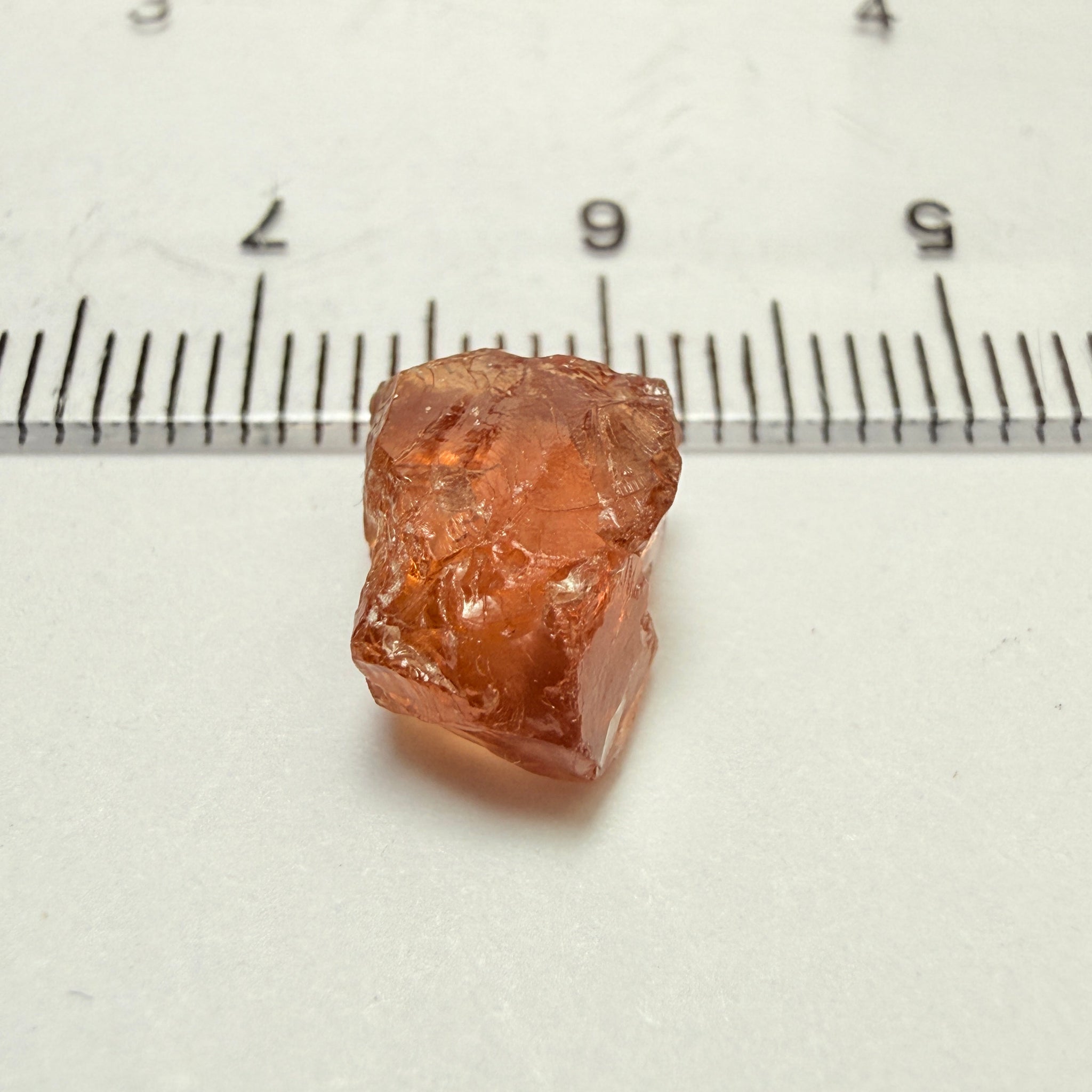 Peach Malaya Garnet, 5.97ct, vvs with 2 small spots on the outside, slight crack on skin, Unheated Untreated, Umba Valley Tanzania