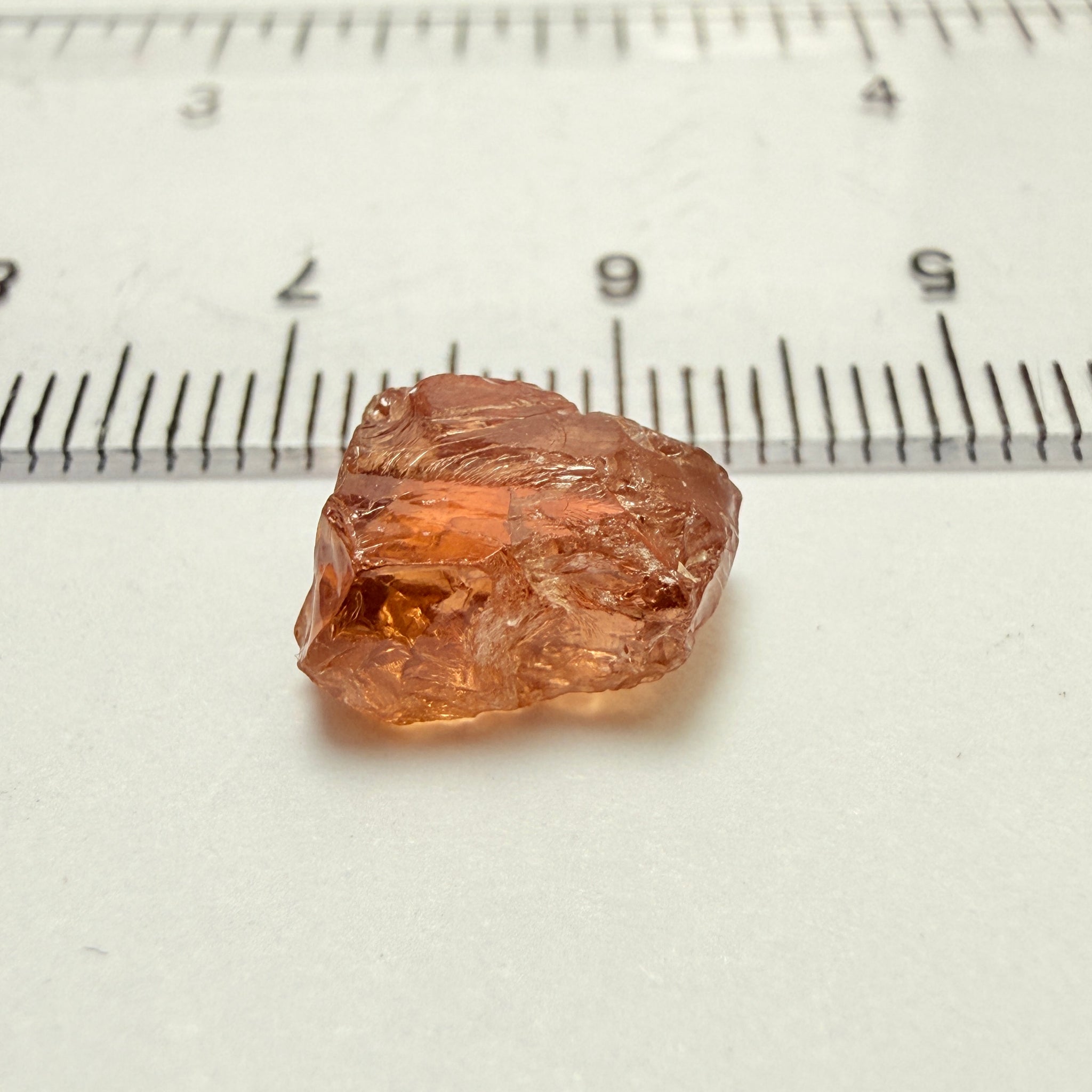Peach Malaya Garnet, 5.97ct, vvs with 2 small spots on the outside, slight crack on skin, Unheated Untreated, Umba Valley Tanzania