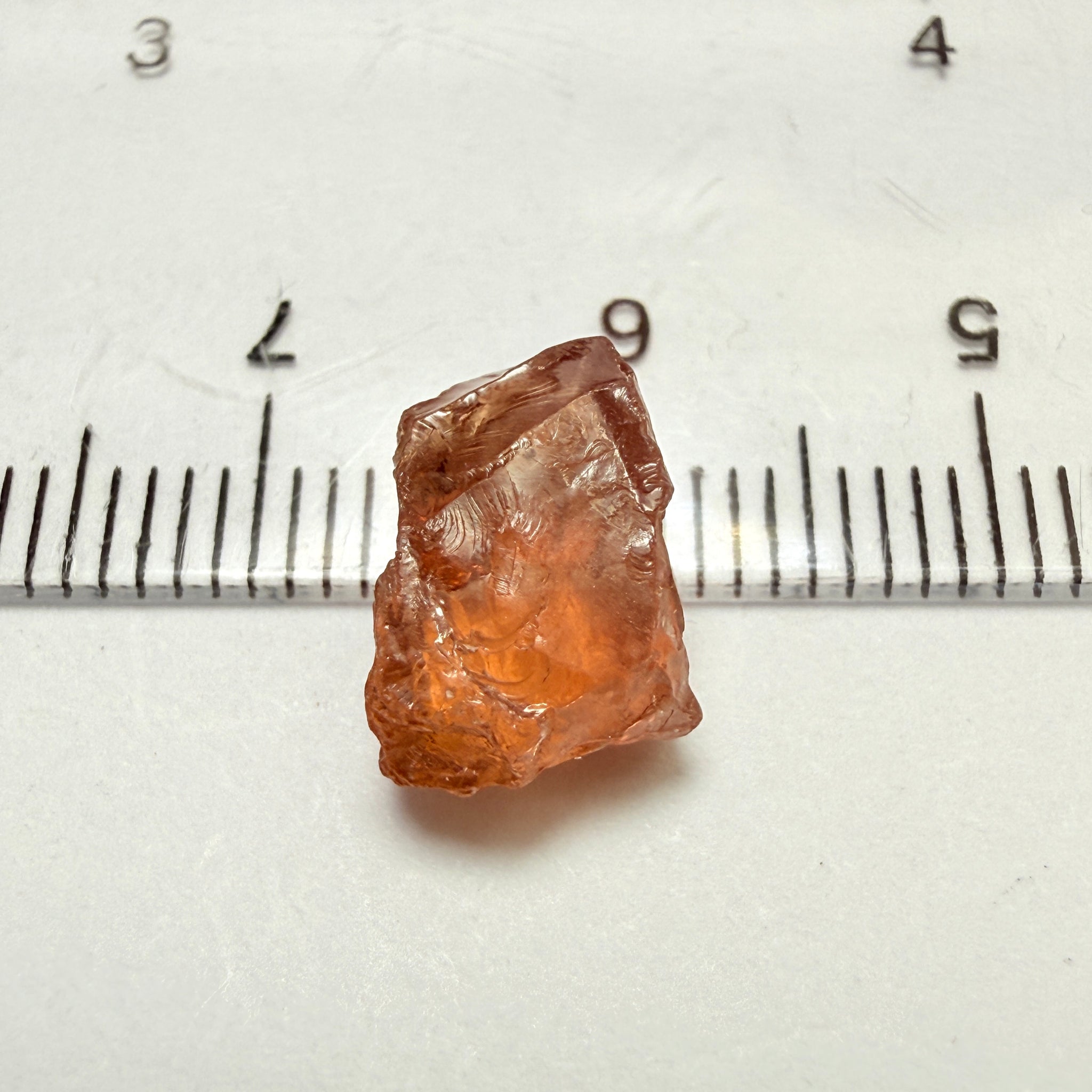 Peach Malaya Garnet, 5.97ct, vvs with 2 small spots on the outside, slight crack on skin, Unheated Untreated, Umba Valley Tanzania