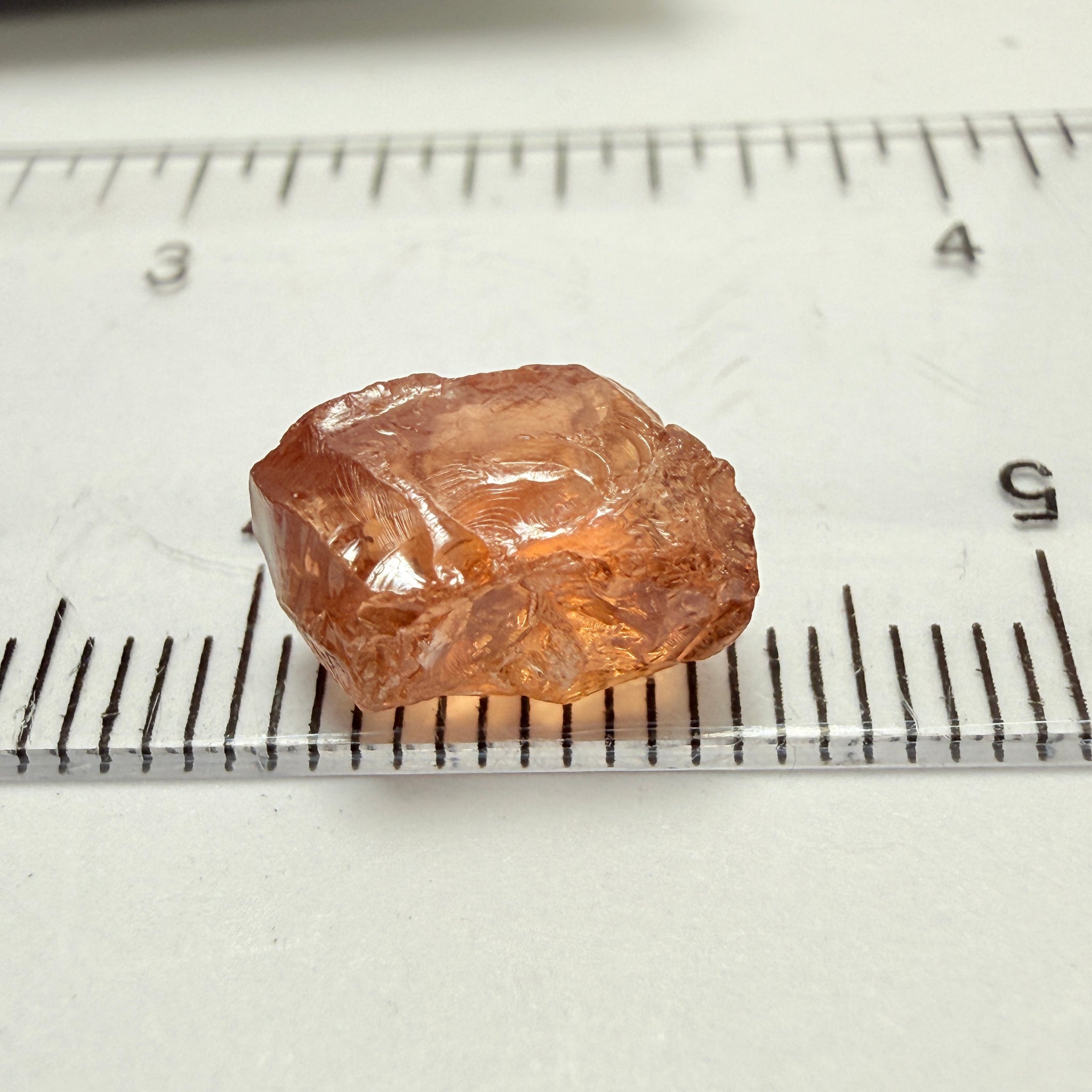 Peach Malaya Garnet, 5.97ct, vvs with 2 small spots on the outside, slight crack on skin, Unheated Untreated, Umba Valley Tanzania