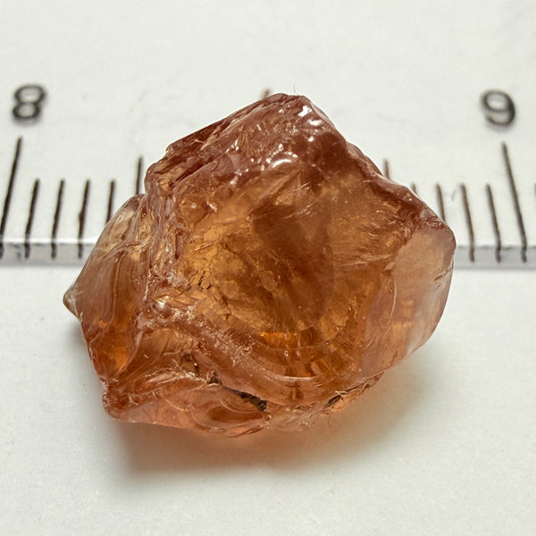 Peach Malaya Garnet, 8.21ct, silk and slight needles but no inclusions, Unheated Untreated, Umba Valley Tanzania, complicated shape.