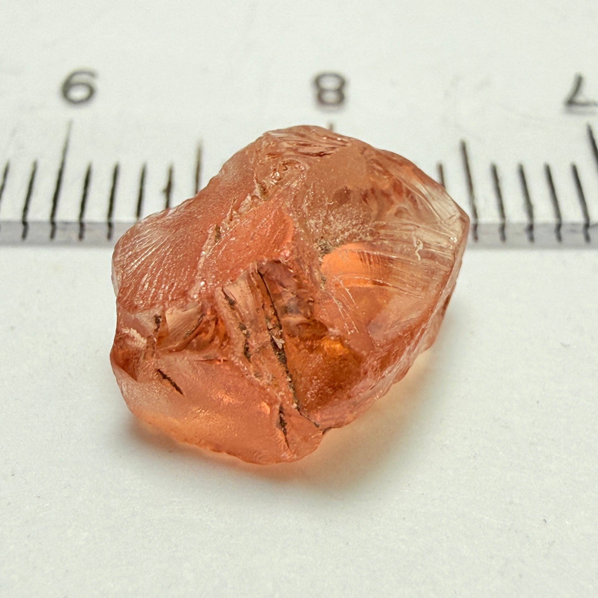 Peach Malaya Garnet, 5.97ct, vvs-if with slight crack on skin, challenging shape, Unheated Untreated, Umba Valley Tanzania