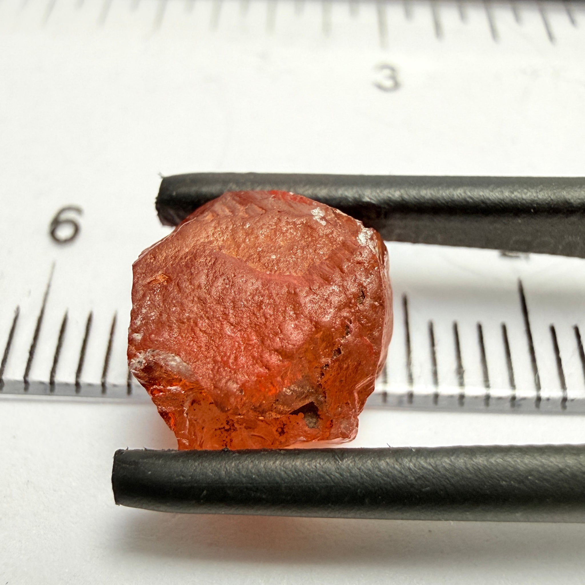 Malaya Garnet, 5.65ct, Tanzania, Untreated Unheated, slightly included and slight surface groove on one side