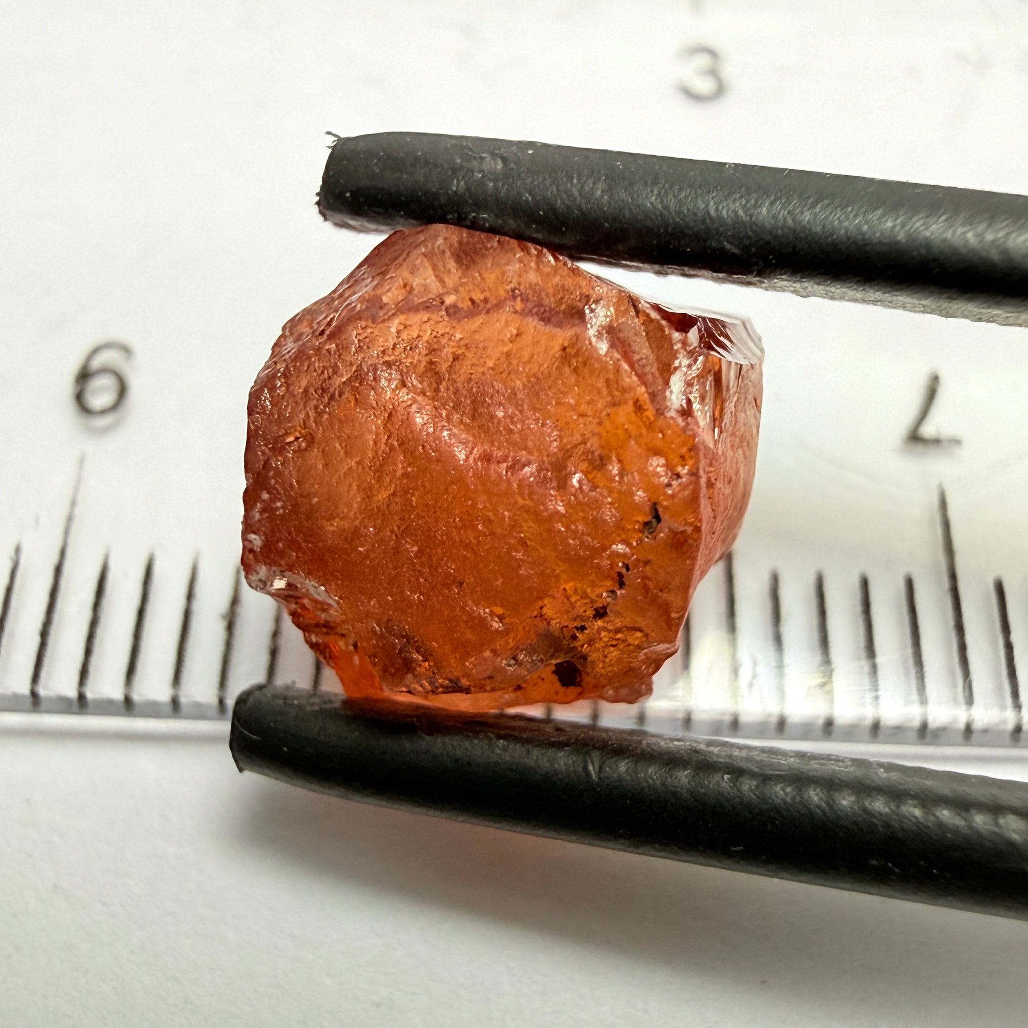 Malaya Garnet, 5.65ct, Tanzania, Untreated Unheated, slightly included and slight surface groove on one side