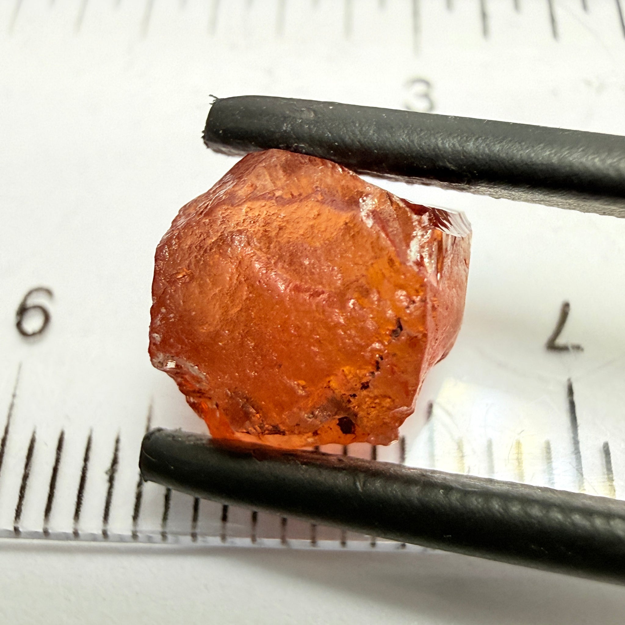 Malaya Garnet, 5.65ct, Tanzania, Untreated Unheated, slightly included and slight surface groove on one side