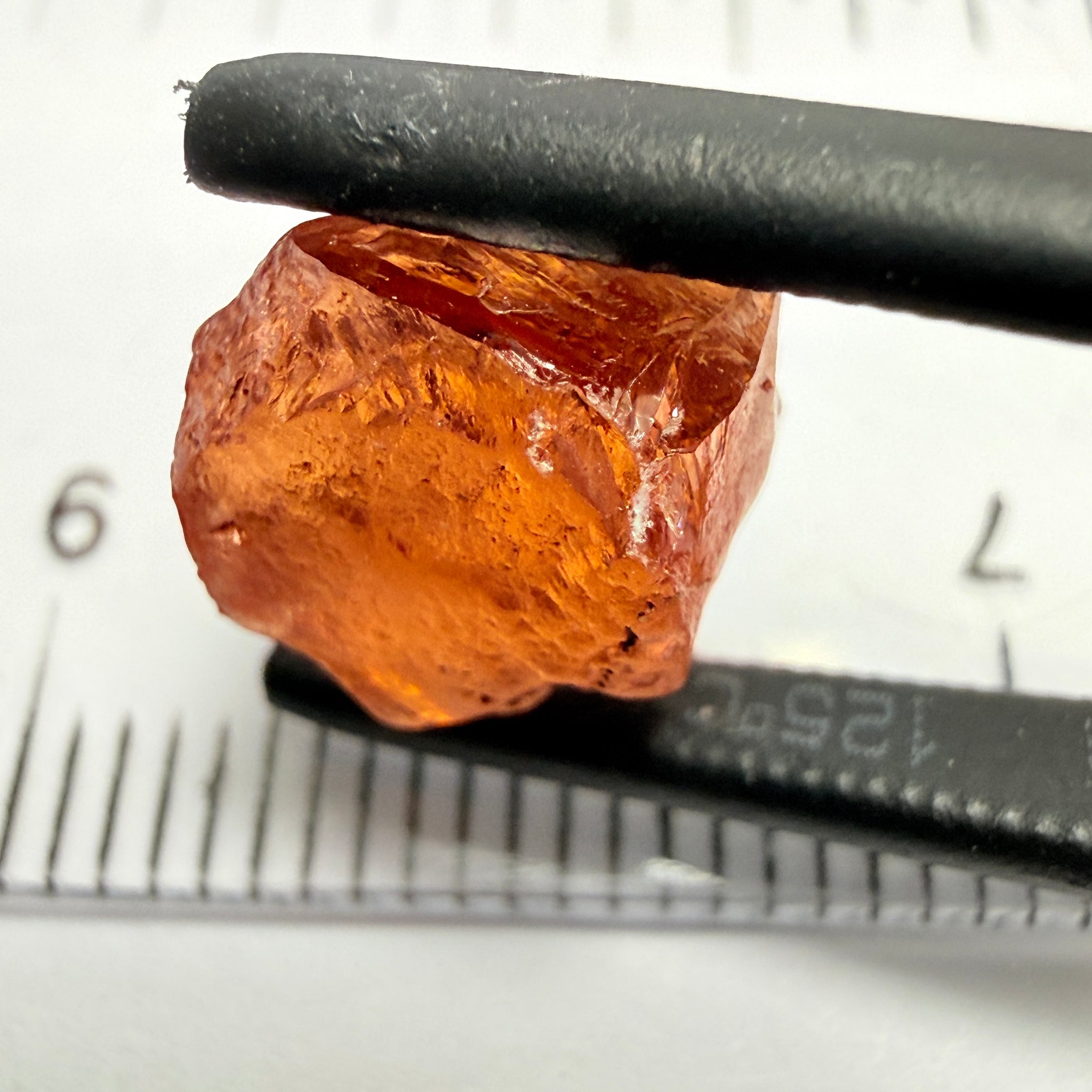Malaya Garnet, 5.65ct, Tanzania, Untreated Unheated, slightly included and slight surface groove on one side
