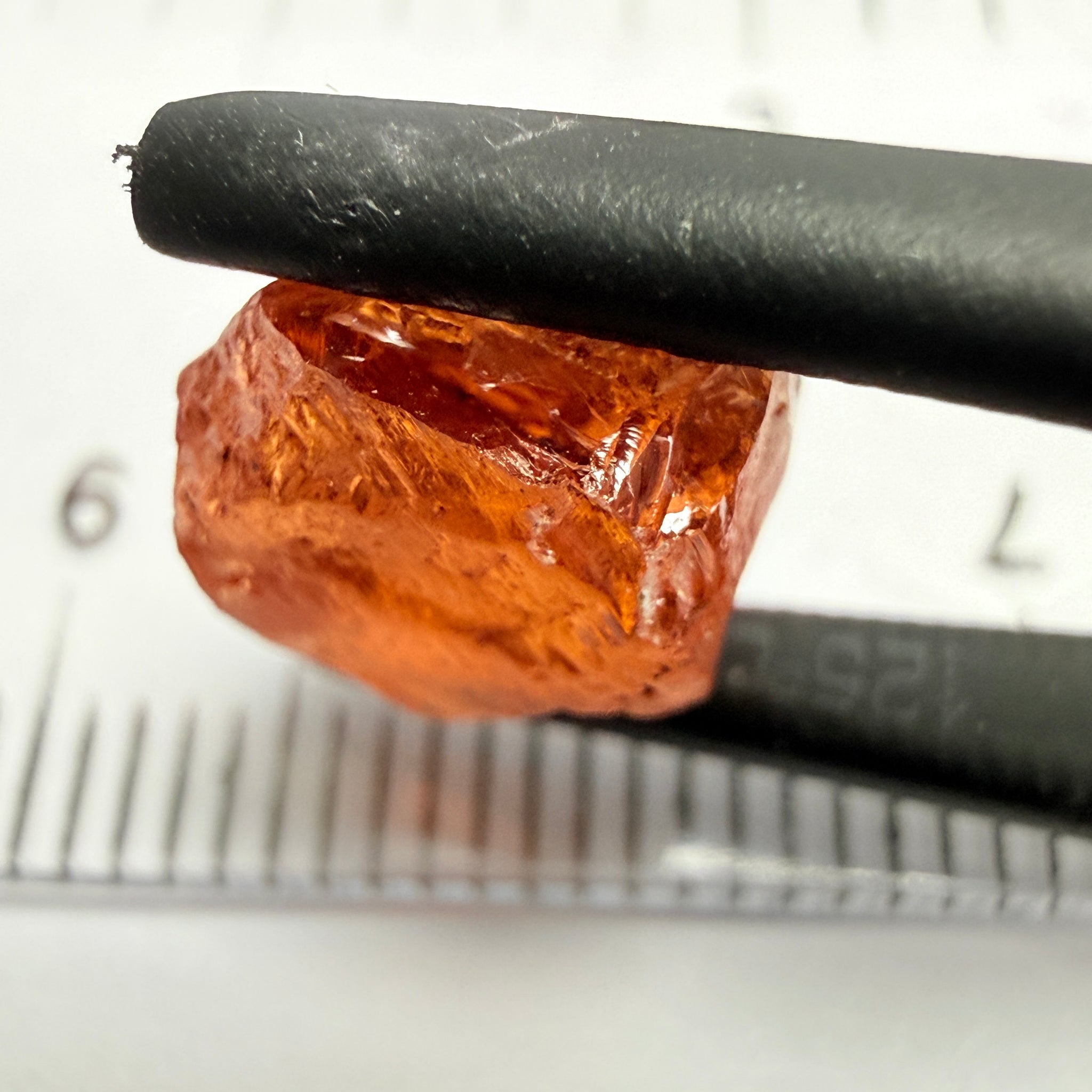 Malaya Garnet, 5.65ct, Tanzania, Untreated Unheated, slightly included and slight surface groove on one side