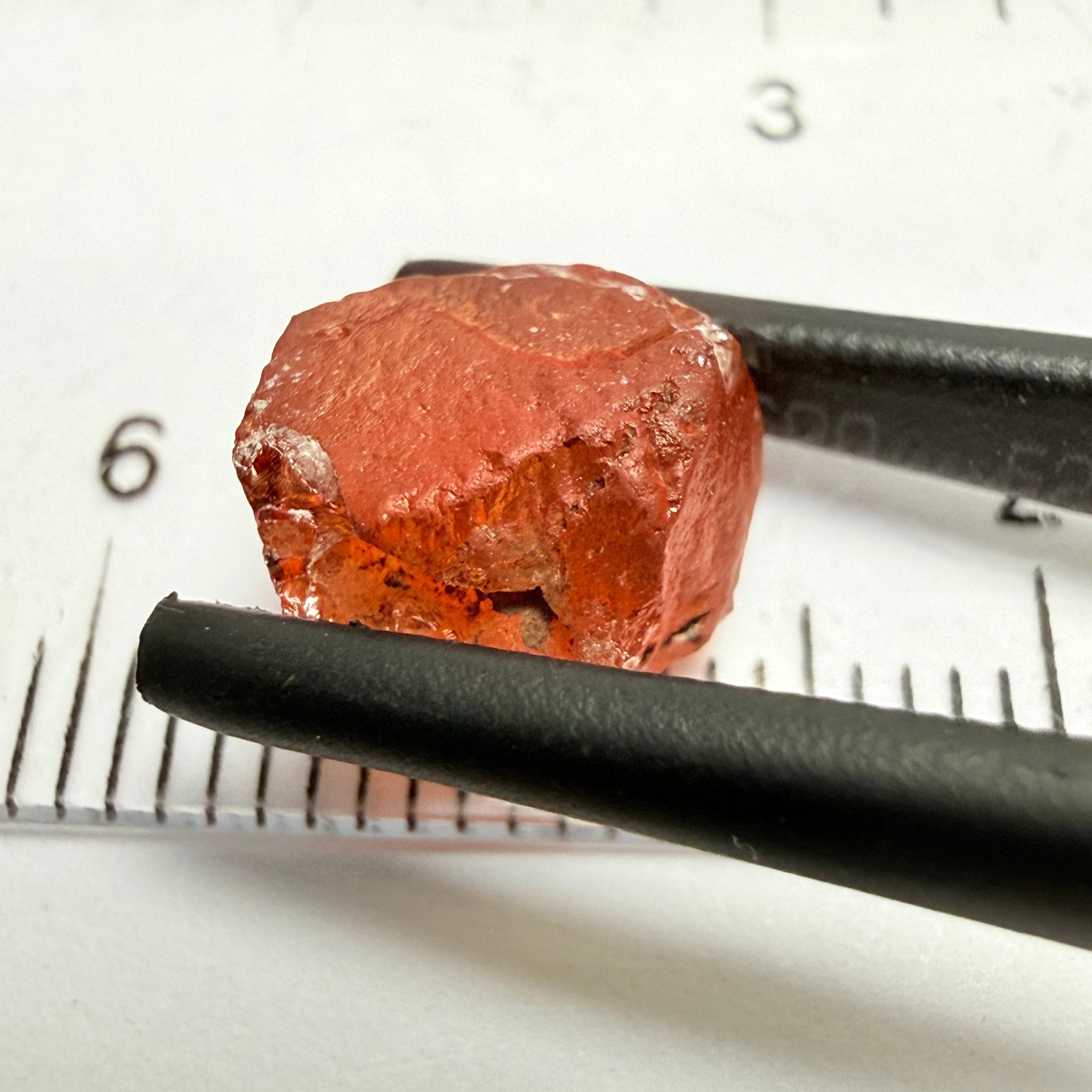 Malaya Garnet, 5.65ct, Tanzania, Untreated Unheated, slightly included and slight surface groove on one side