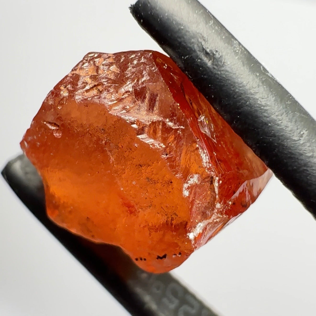 Malaya Garnet, 5.65ct, Tanzania, Untreated Unheated, slightly included and slight surface groove on one side