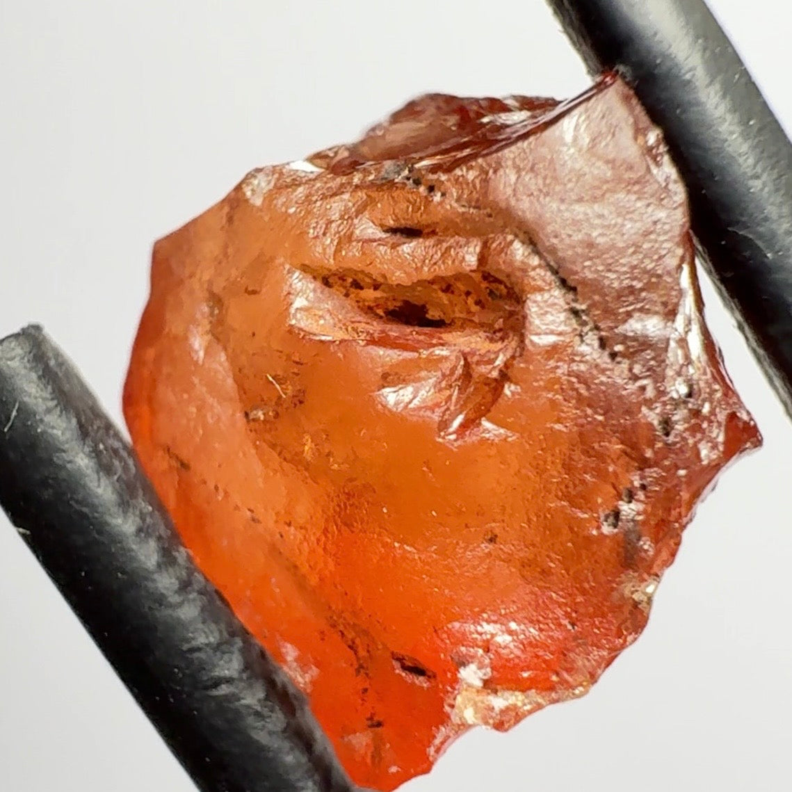 Malaya Garnet, 5.65ct, Tanzania, Untreated Unheated, slightly included and slight surface groove on one side