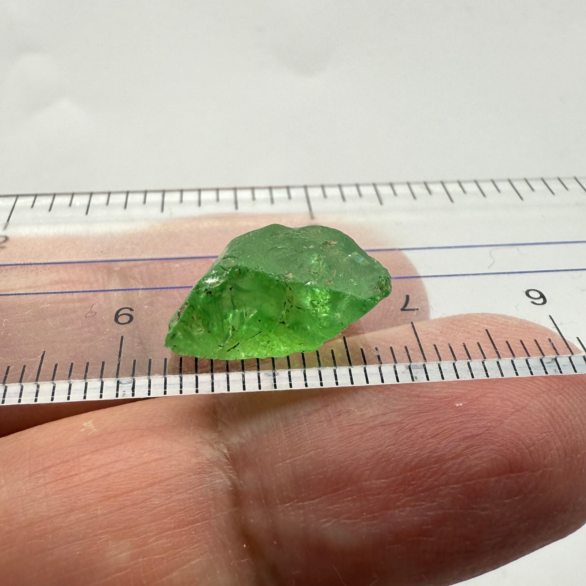 Tsavorite, 8.34ct, Tanzania, Untreated Unheated, cracks and veils in the stone, have a look at the video for positioning