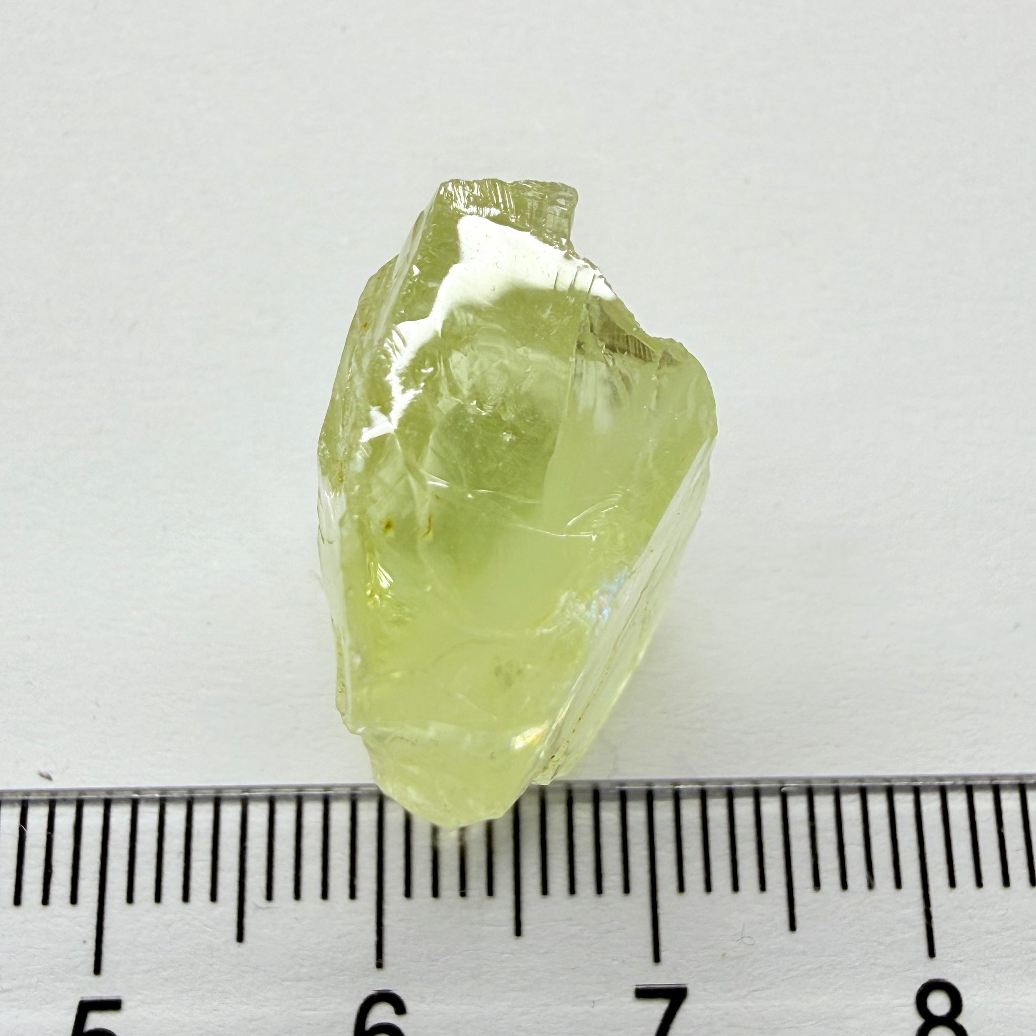 Heliodor, 29.39ct, Loliondo, Tanzania, Untreated Unheated, has a fracture inside, slice down the middle, both pics will be useable with one slightly flatter, both will be slightly milky