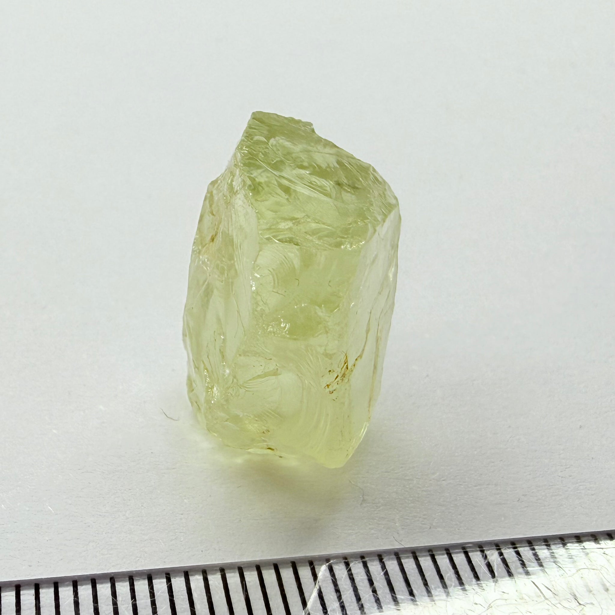 Heliodor, 29.39ct, Loliondo, Tanzania, Untreated Unheated, has a fracture inside, slice down the middle, both pics will be useable with one slightly flatter, both will be slightly milky