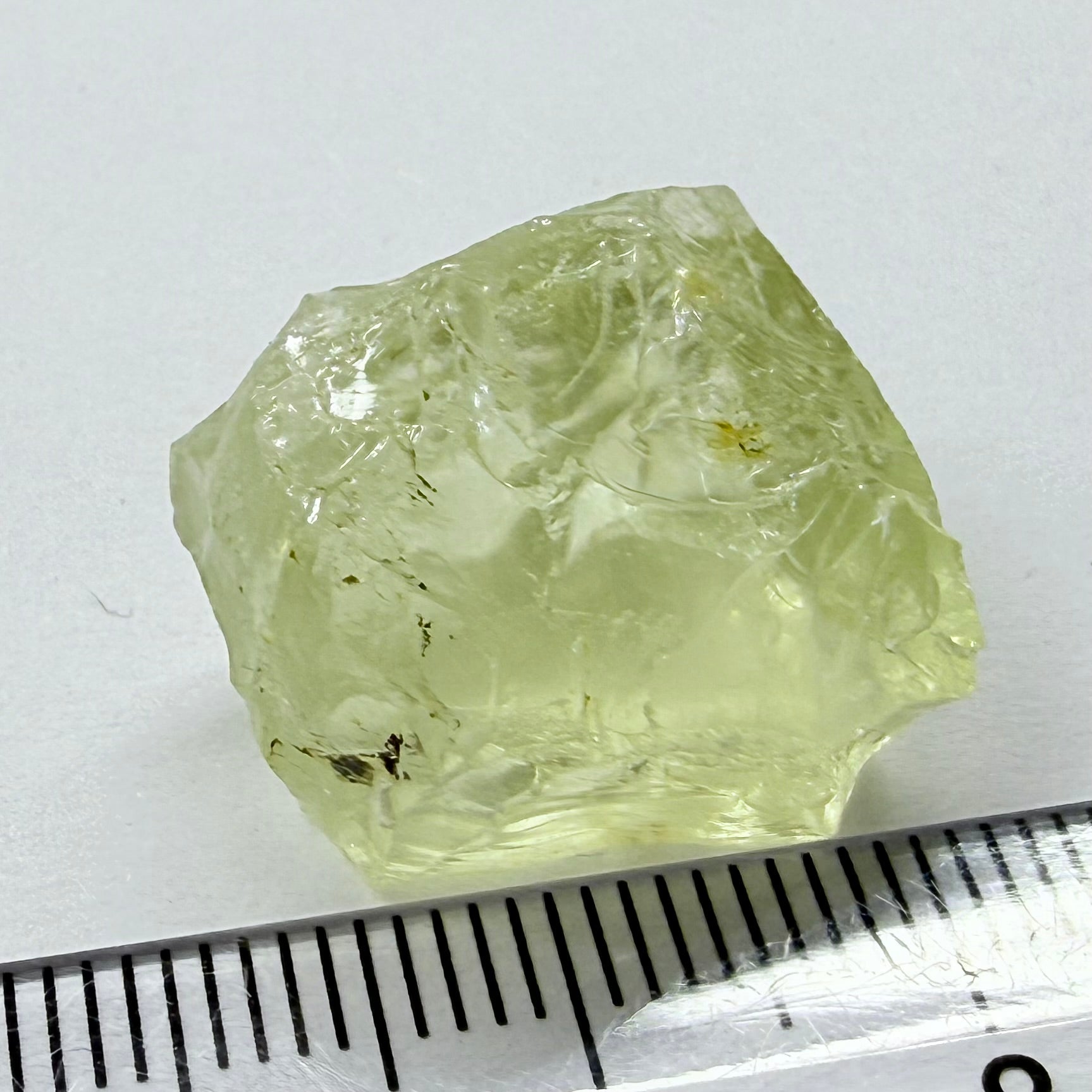 Heliodor, 29.39ct, Loliondo, Tanzania, Untreated Unheated, has a fracture inside, slice down the middle, both pics will be useable with one slightly flatter, both will be slightly milky