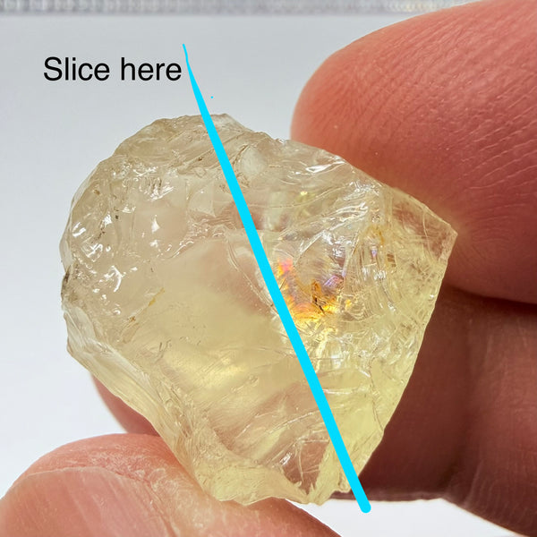 Heliodor, 29.39ct, Loliondo, Tanzania, Untreated Unheated, has a fracture inside, slice down the middle, both pics will be useable with one slightly flatter, both will be slightly milky