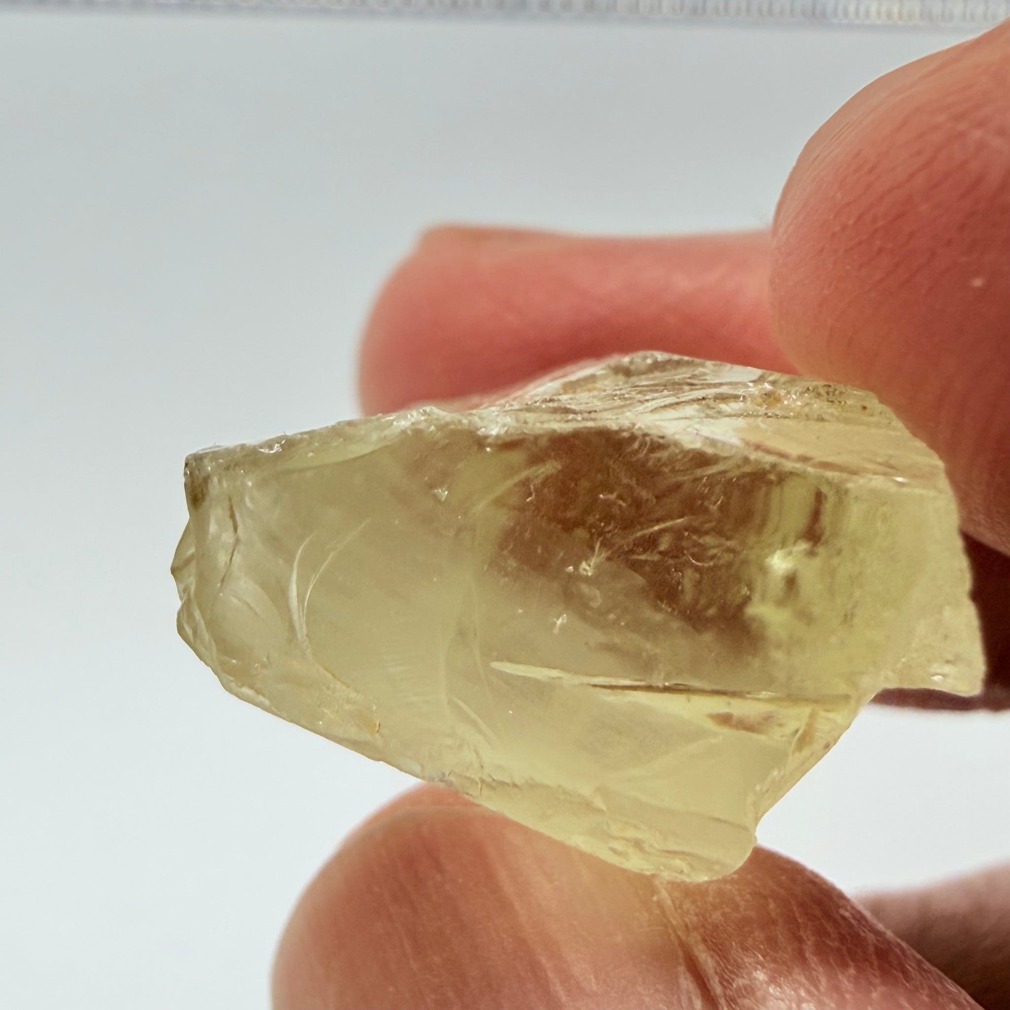 Heliodor, 29.39ct, Loliondo, Tanzania, Untreated Unheated, has a fracture inside, slice down the middle, both pics will be useable with one slightly flatter, both will be slightly milky