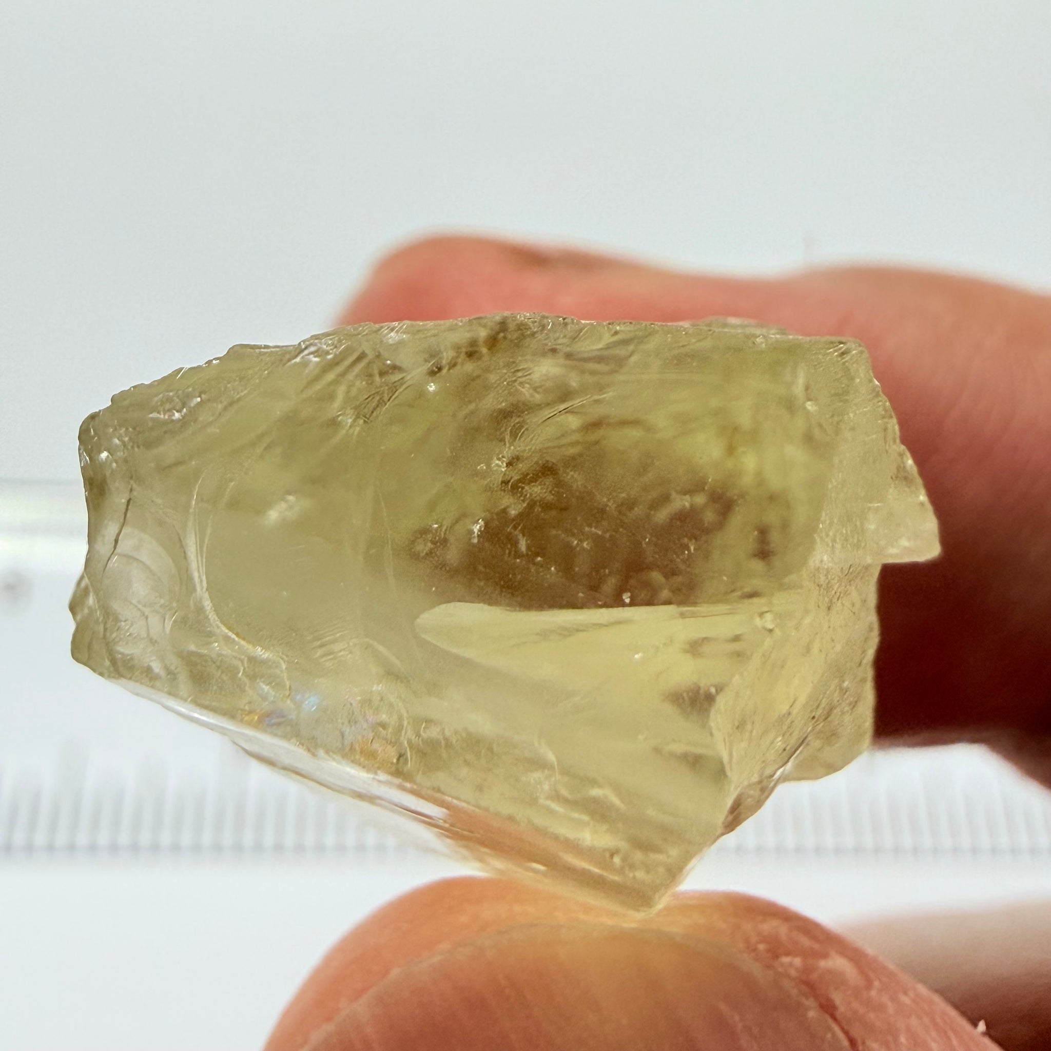 Heliodor, 29.39ct, Loliondo, Tanzania, Untreated Unheated, has a fracture inside, slice down the middle, both pics will be useable with one slightly flatter, both will be slightly milky