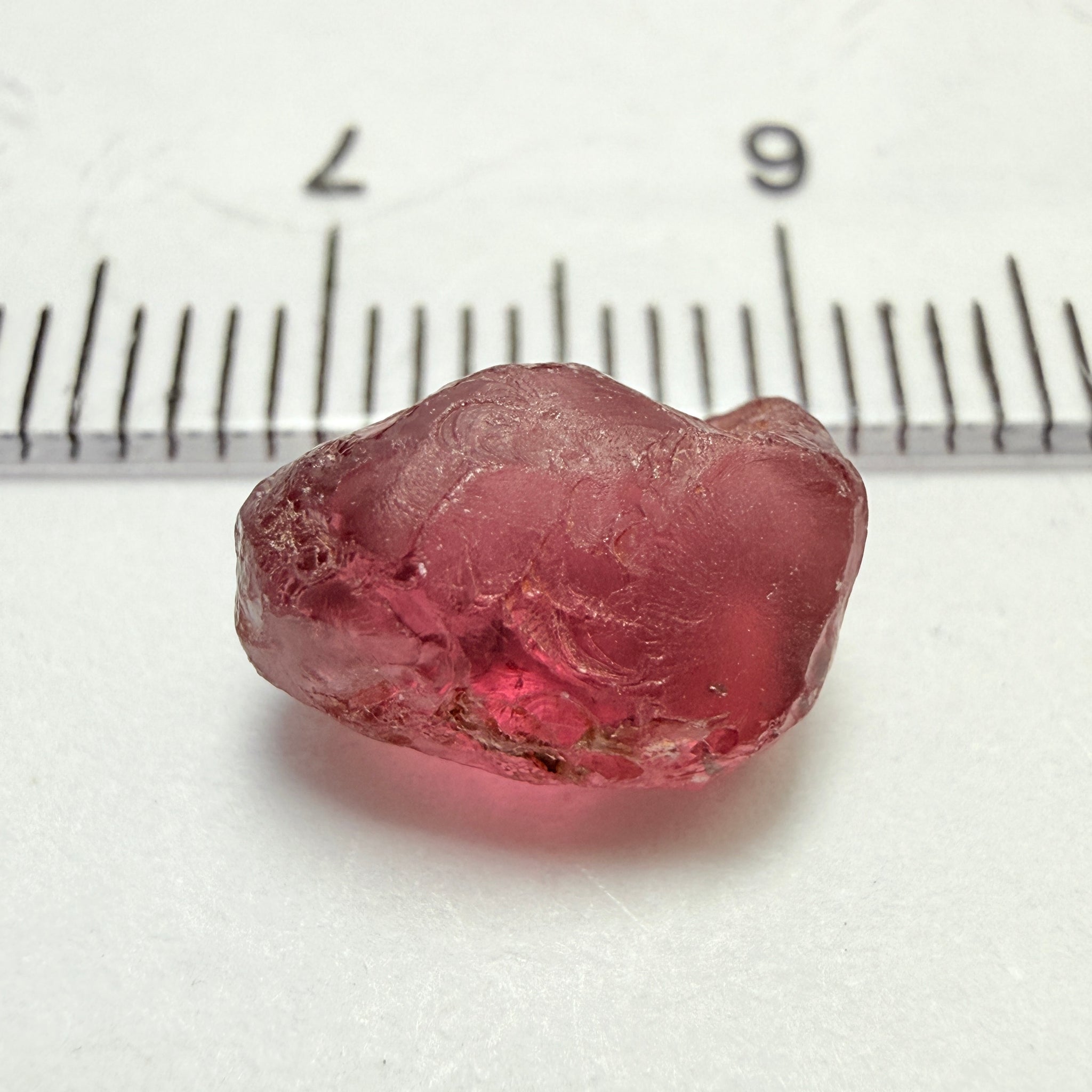 Rhodolite Garnet, 4.75ct, Umba, Tanzania, Untreated Untreated. Few bubbles right on the outside 1mm into the skin, rest vvs, also note the weird skin indentation, see pics