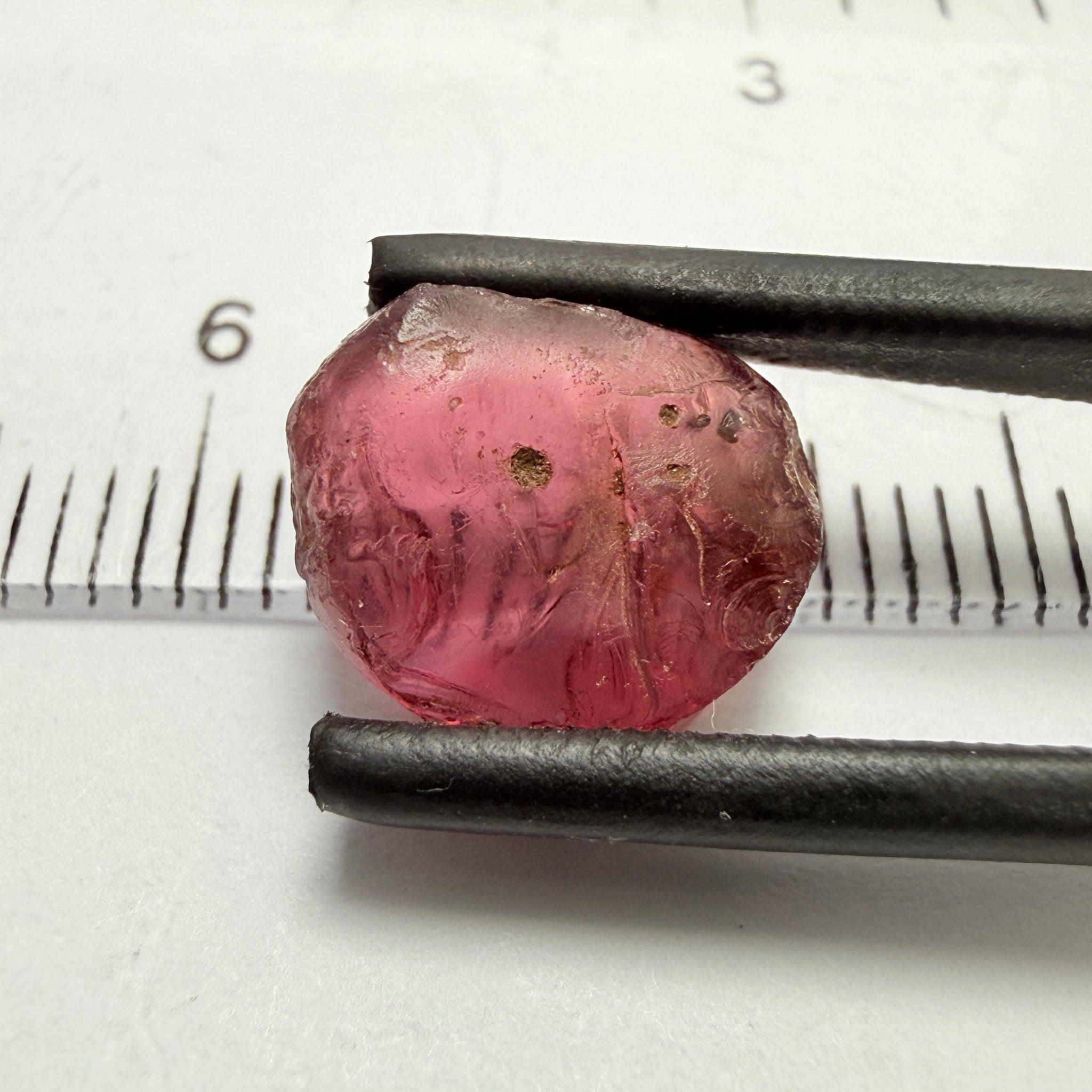Rhodolite Garnet, 6.56ct, Umba, Tanzania, Untreated Untreated. Few bubbles on outside, rest vvs with very slight silk, flattish shape see pics