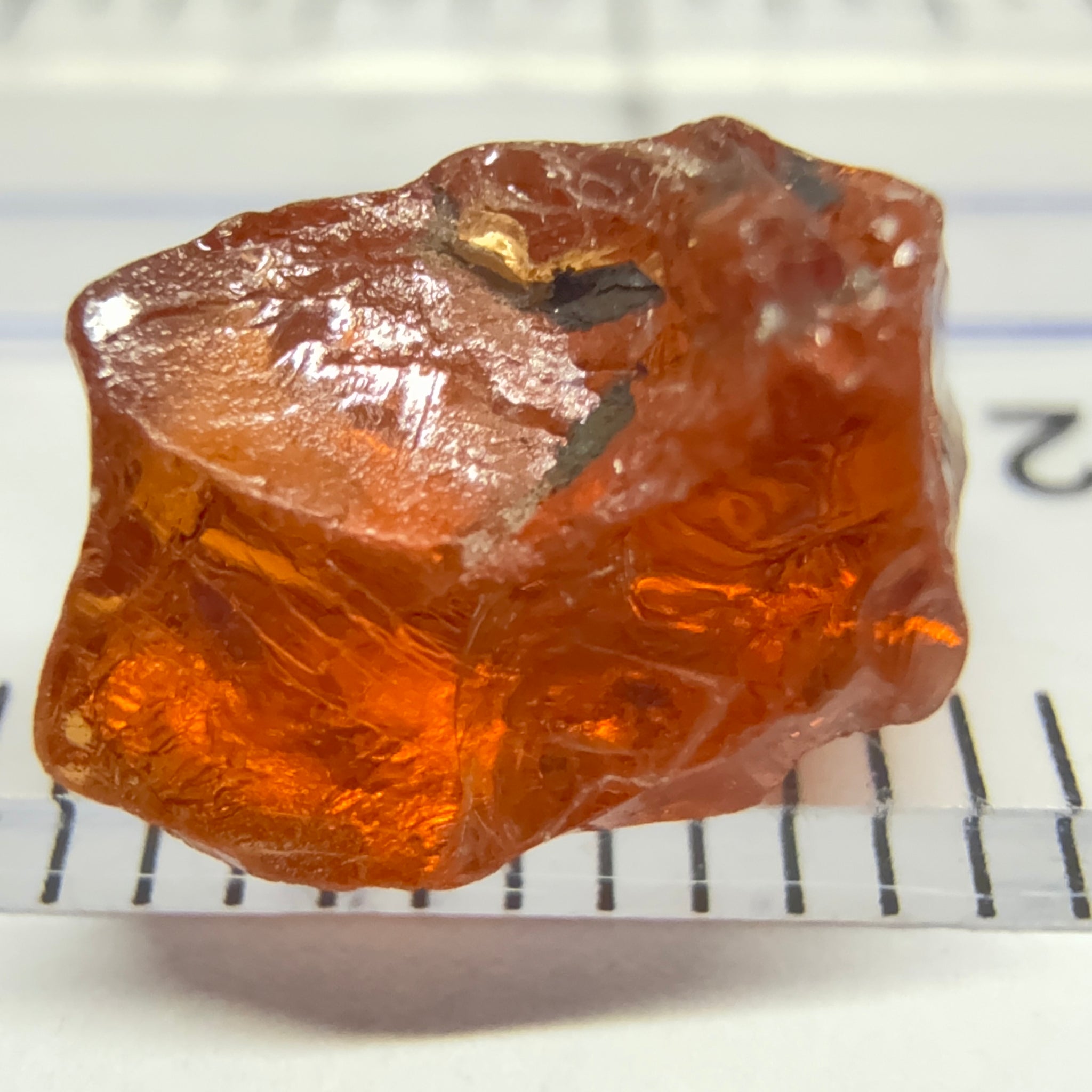 Malaya Garnet, 4.33ct, Tanzania, Untreated Unheated. Slight crack on the outside skin will come off on faceting, rest vvs-if, note the shape though