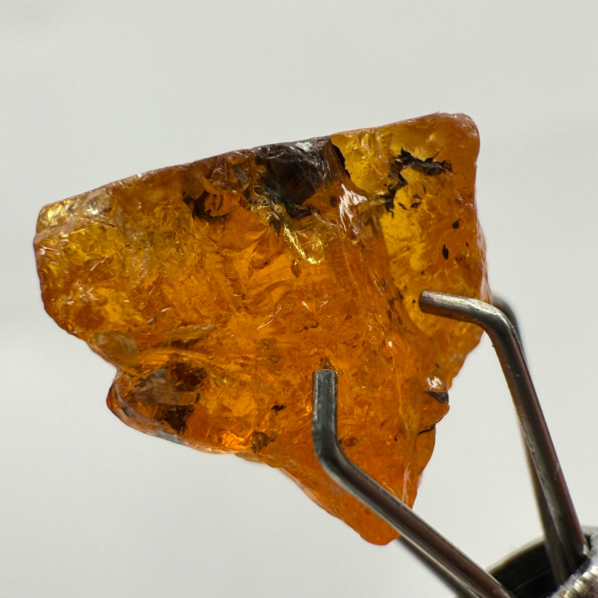 Mandarin Spessartite Garnet, 4.86ct, Loliondo, Tanzania, Untreated Unheated, shape is flattish, heavily included, see pictures for inclusion locations, and if it’s ok it’s priced really well