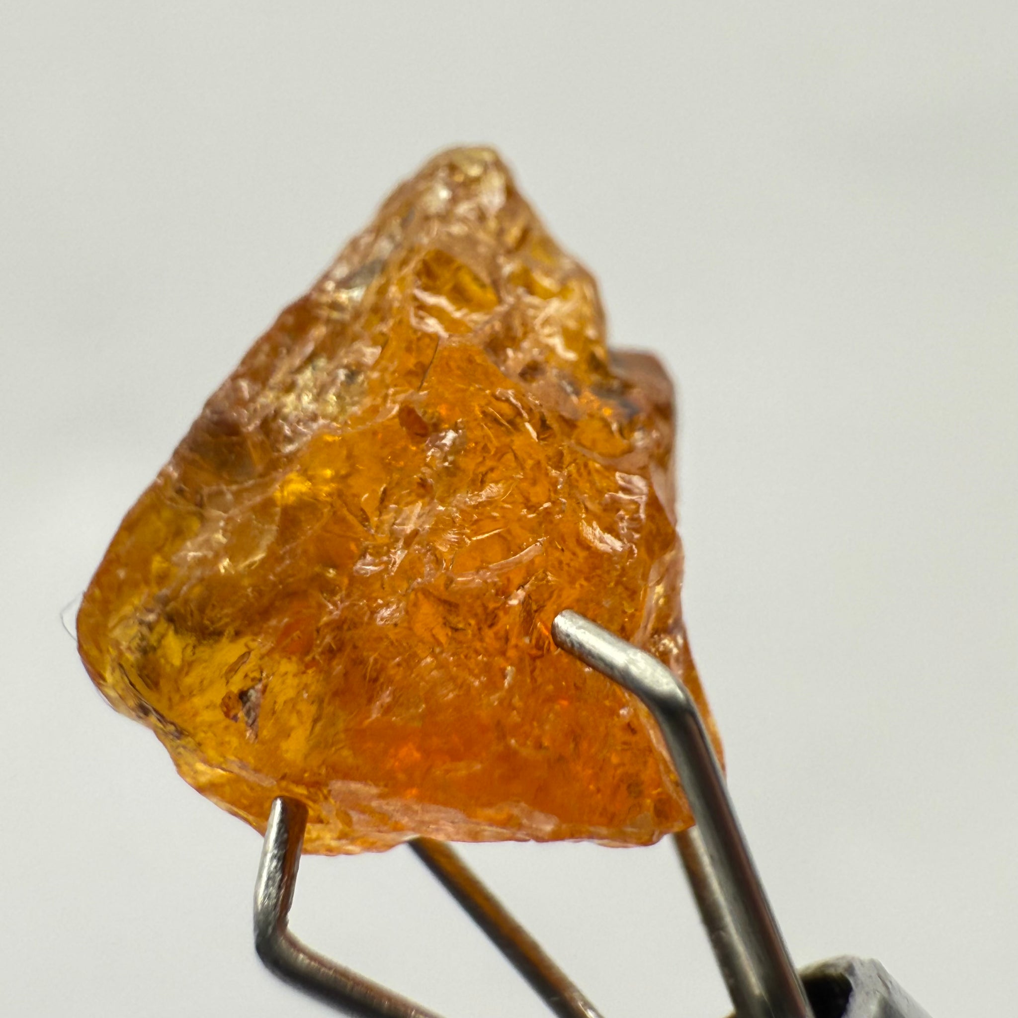 Mandarin Spessartite Garnet, 4.86ct, Loliondo, Tanzania, Untreated Unheated, shape is flattish, heavily included, see pictures for inclusion locations, and if it’s ok it’s priced really well