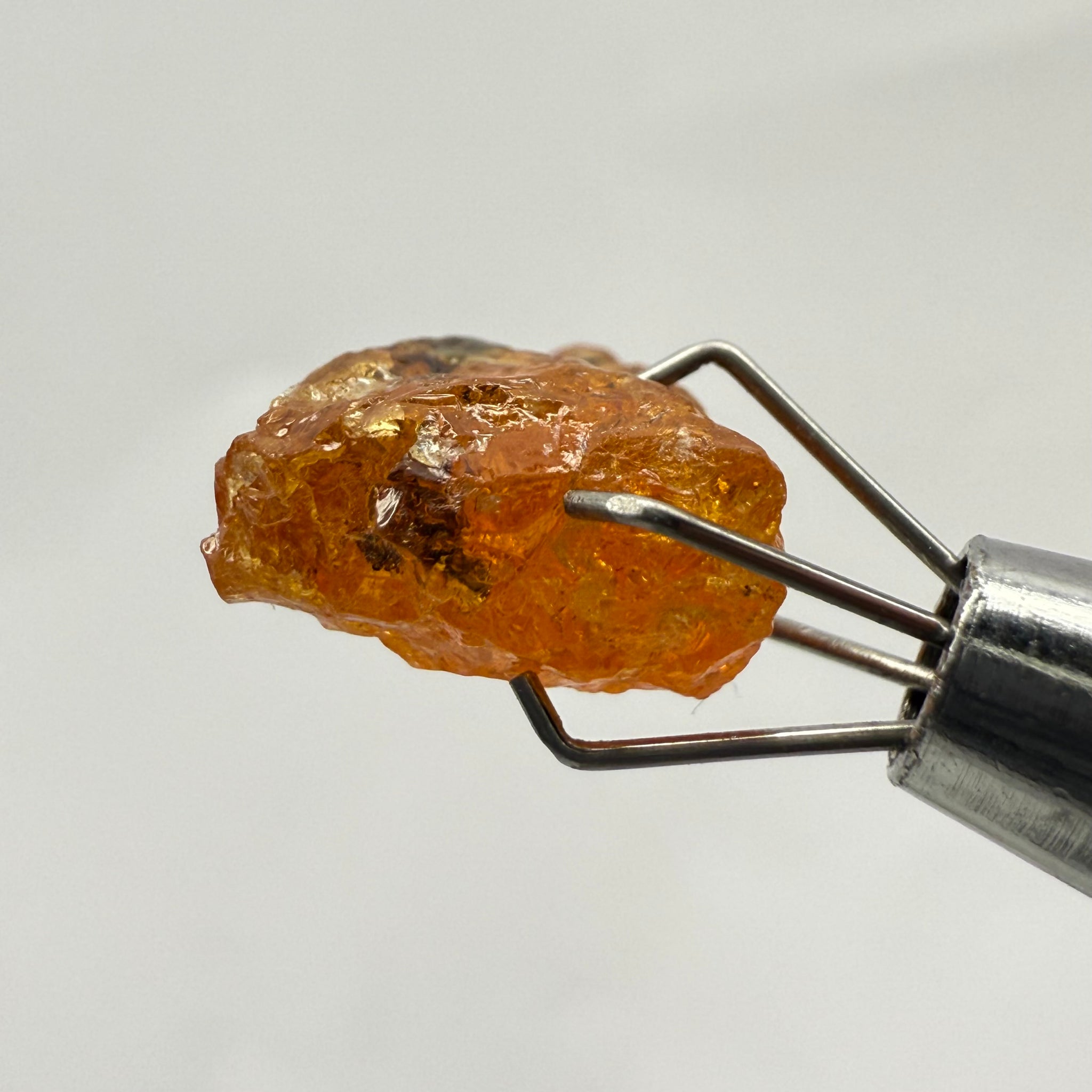 Mandarin Spessartite Garnet, 4.86ct, Loliondo, Tanzania, Untreated Unheated, shape is flattish, heavily included, see pictures for inclusion locations, and if it’s ok it’s priced really well