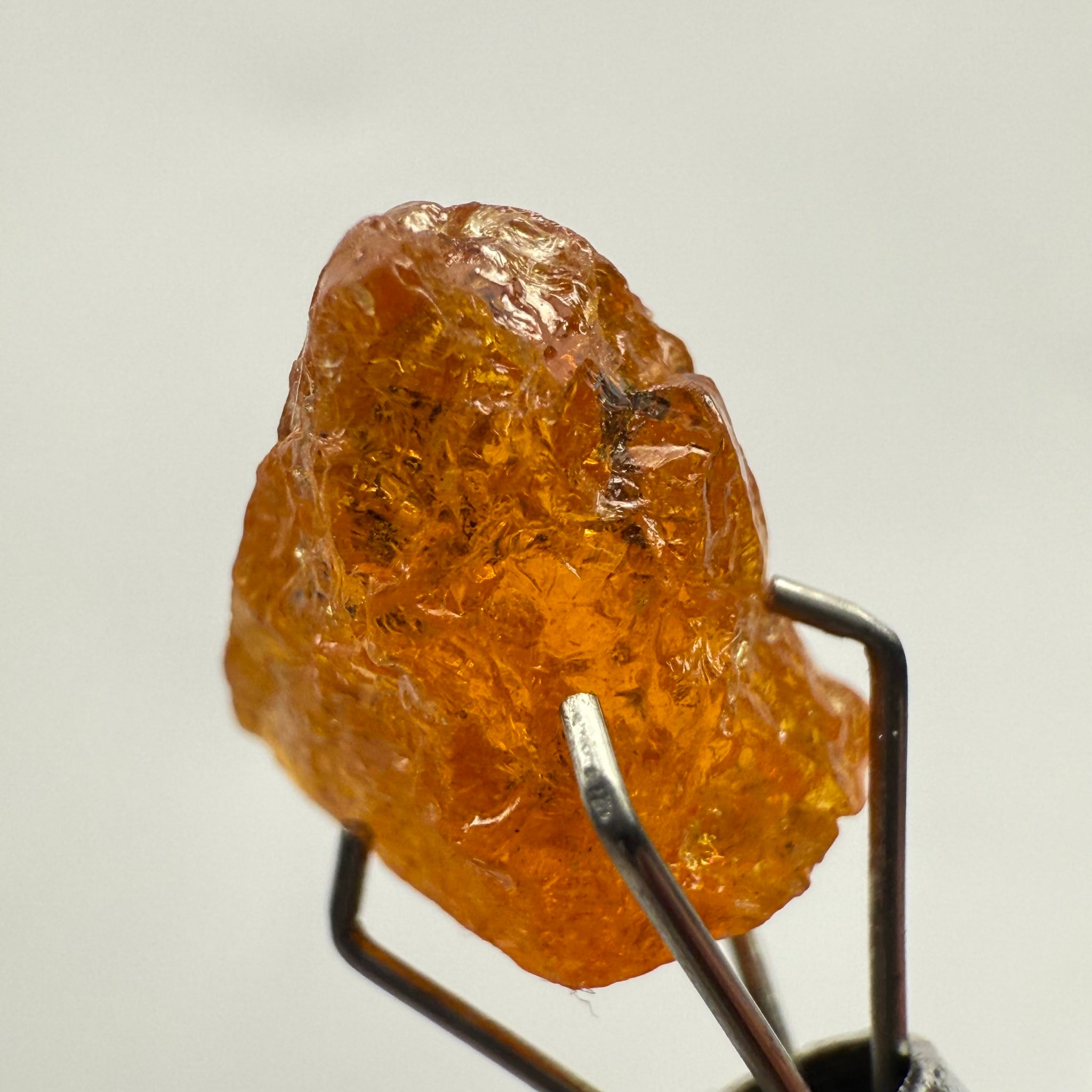 Mandarin Spessartite Garnet, 4.86ct, Loliondo, Tanzania, Untreated Unheated, shape is flattish, heavily included, see pictures for inclusion locations, and if it’s ok it’s priced really well