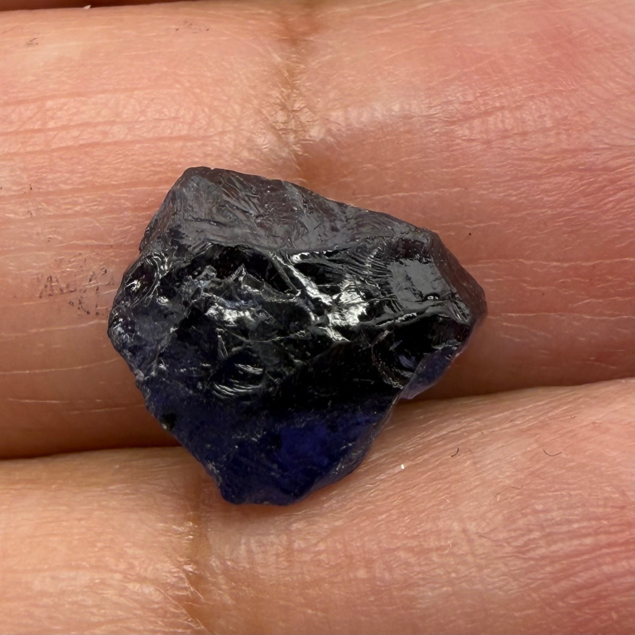 Iolite, 4.84ct, Tanzania, Untreated Unheated, slight inclusions and some white spots, has a flattish shape