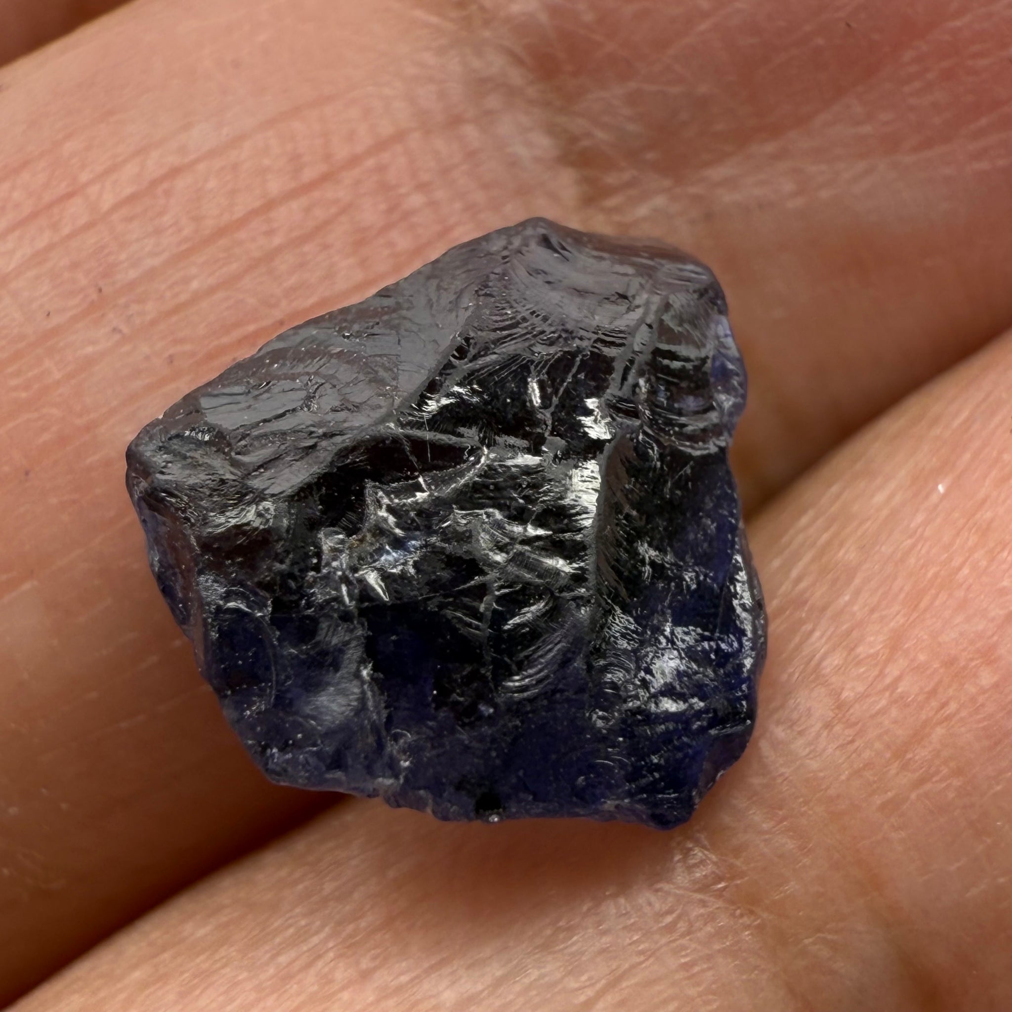 Iolite, 4.84ct, Tanzania, Untreated Unheated, slight inclusions and some white spots, has a flattish shape