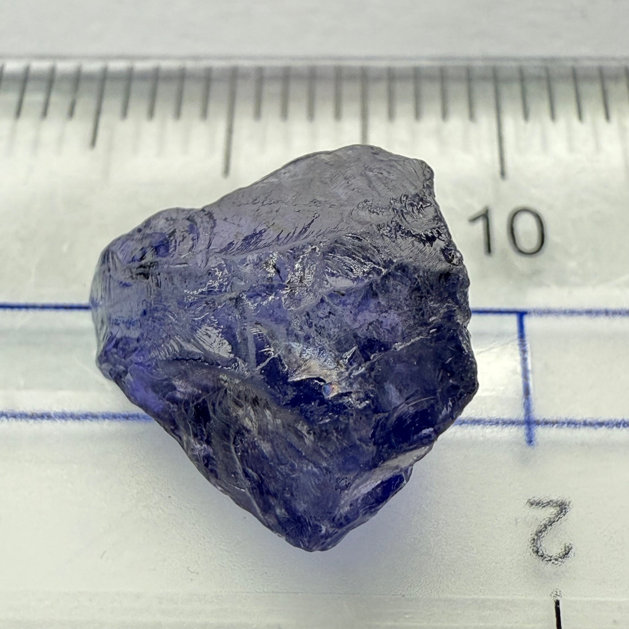 Iolite, 4.84ct, Tanzania, Untreated Unheated, slight inclusions and some white spots, has a flattish shape
