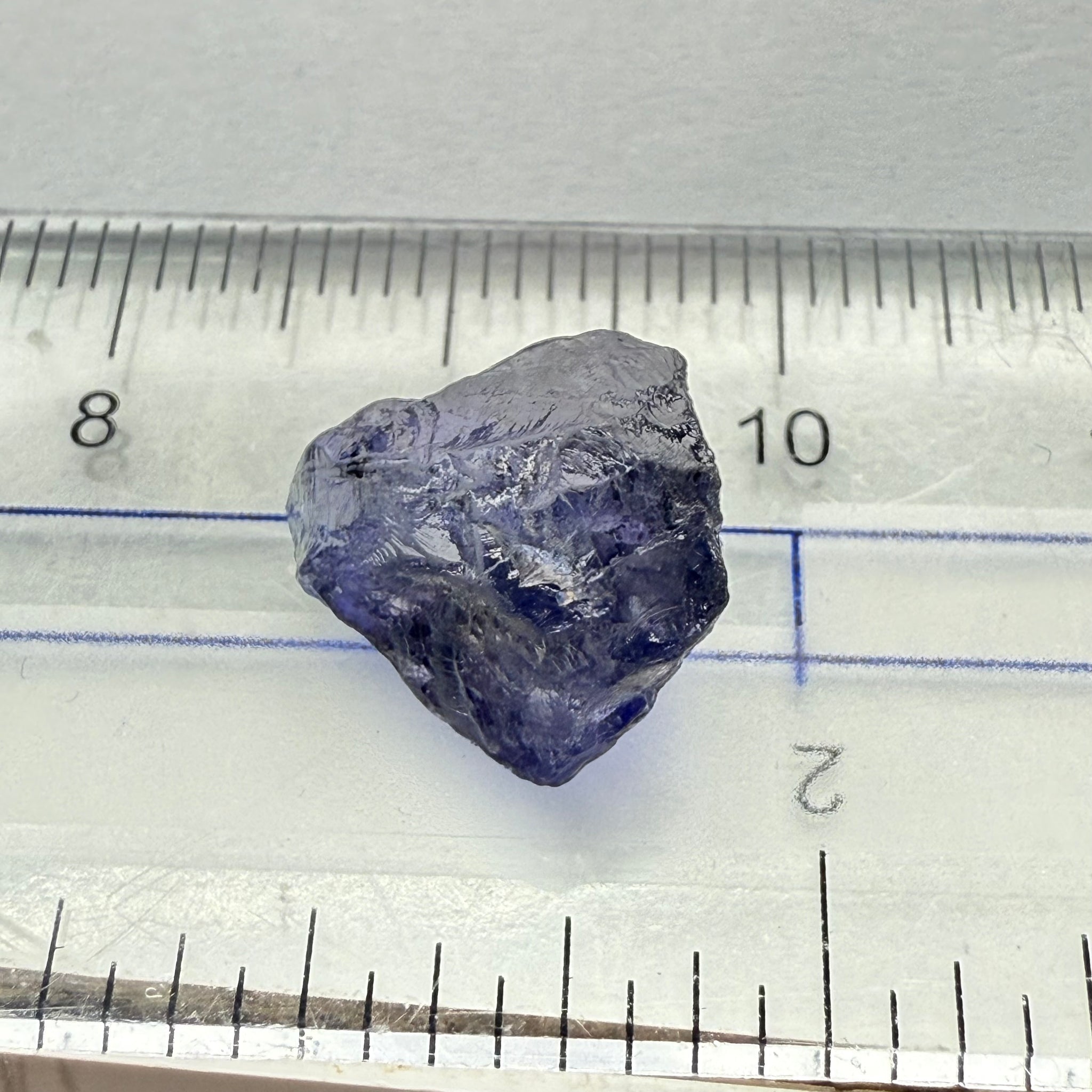 Iolite, 4.84ct, Tanzania, Untreated Unheated, slight inclusions and some white spots, has a flattish shape
