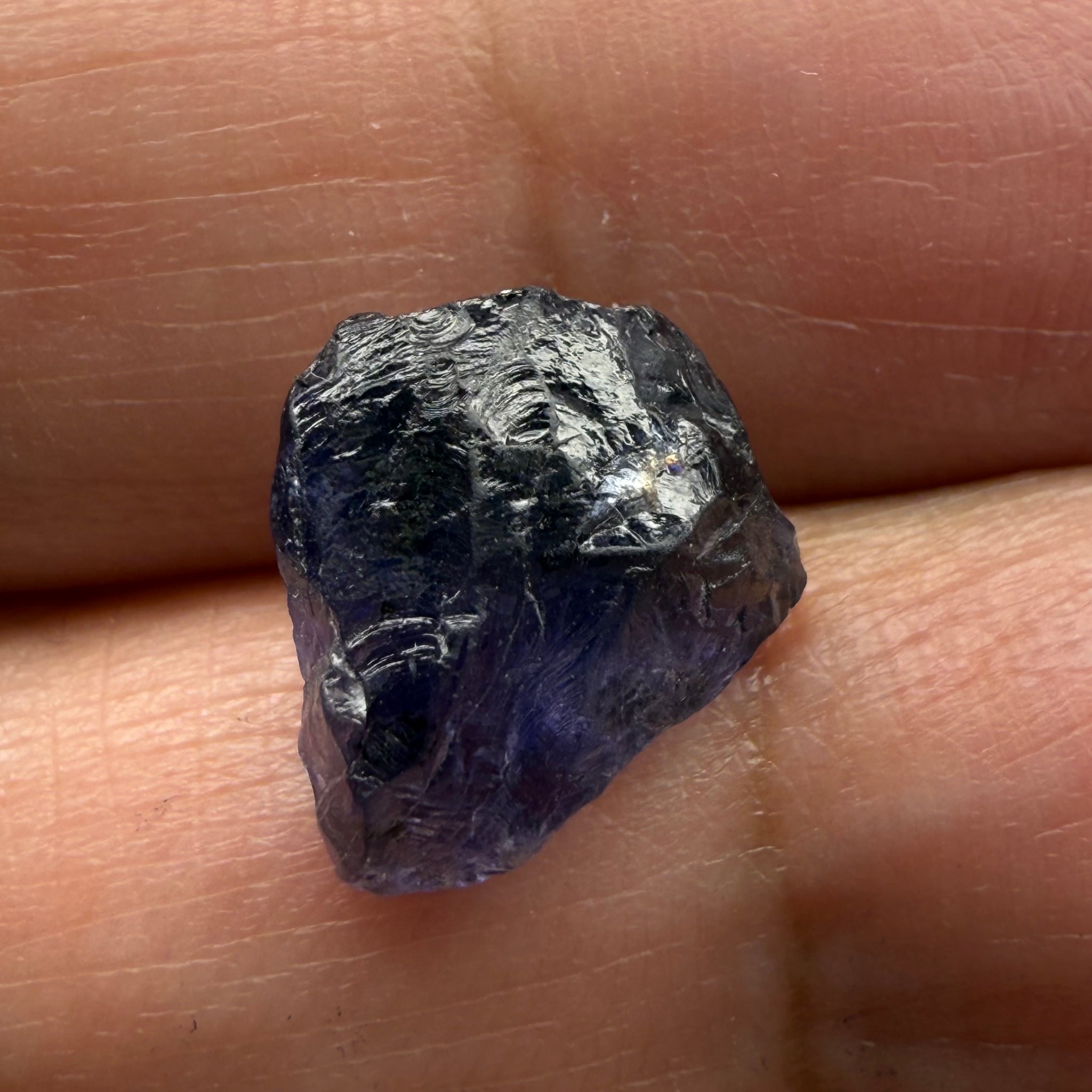 Iolite, 4.84ct, Tanzania, Untreated Unheated, slight inclusions and some white spots, has a flattish shape