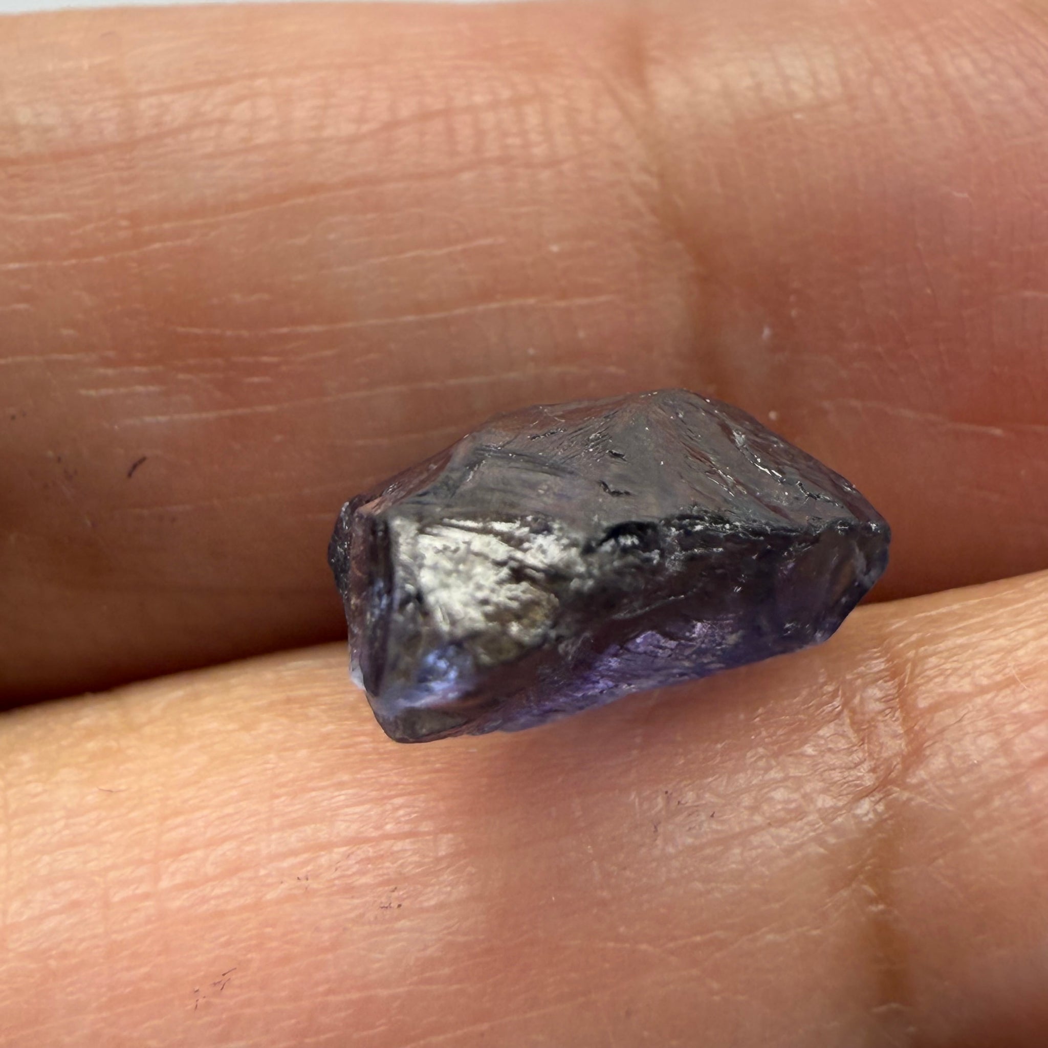 Iolite, 4.84ct, Tanzania, Untreated Unheated, slight inclusions and some white spots, has a flattish shape