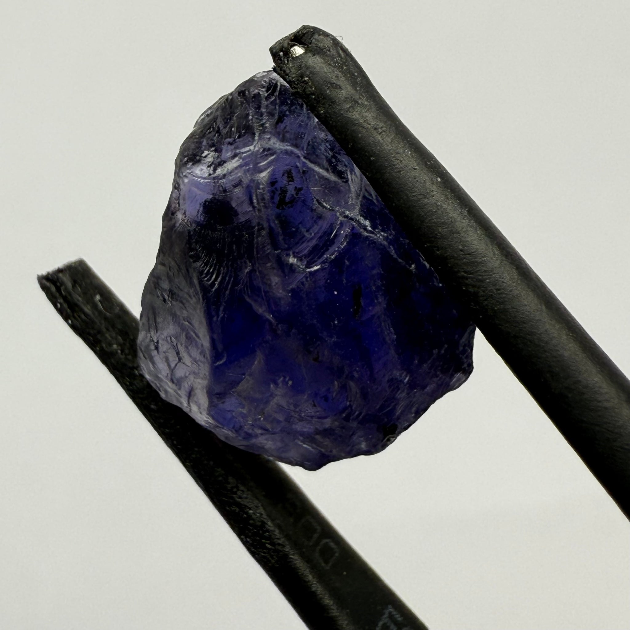 Iolite, 4.84ct, Tanzania, Untreated Unheated, slight inclusions and some white spots, has a flattish shape