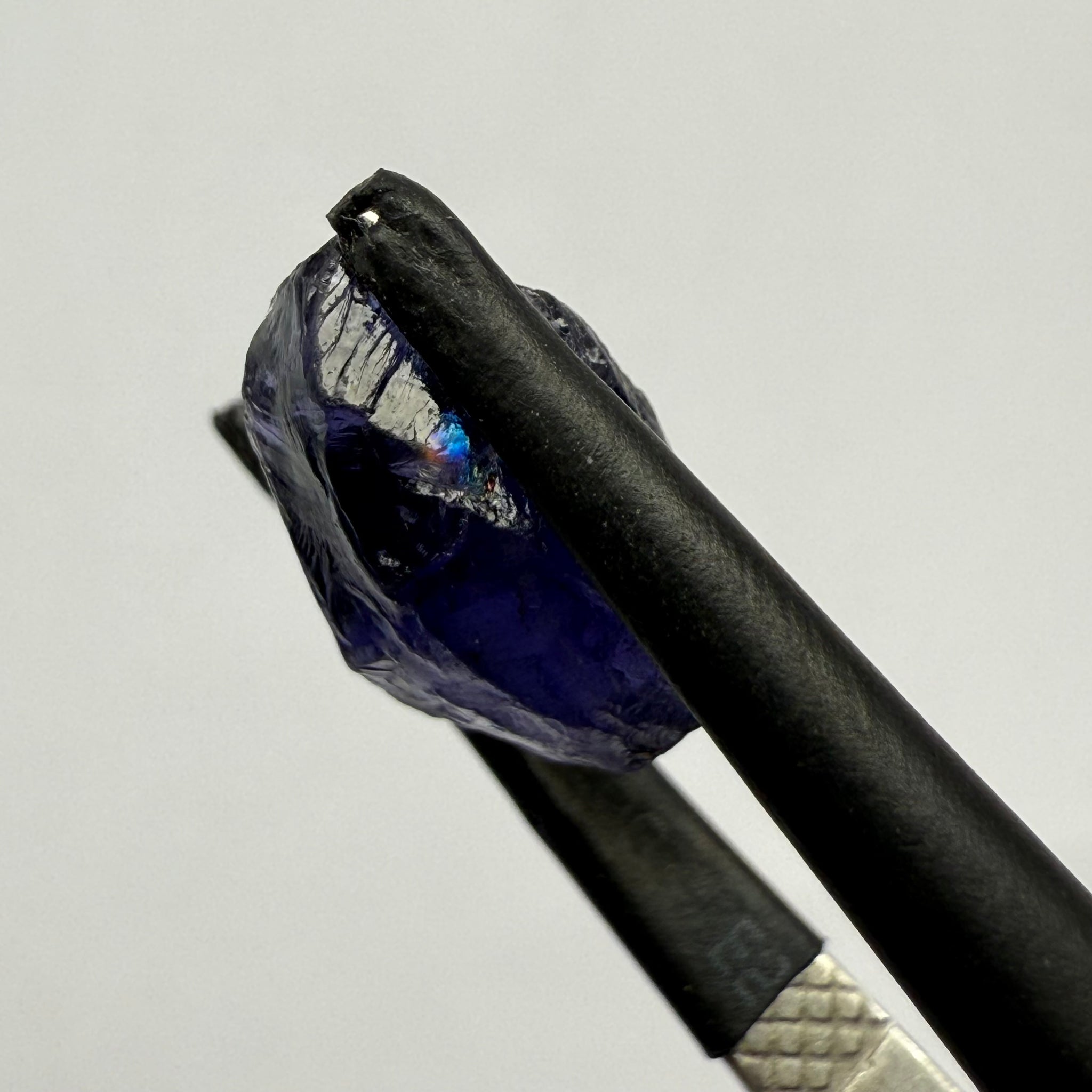 Iolite, 4.84ct, Tanzania, Untreated Unheated, slight inclusions and some white spots, has a flattish shape