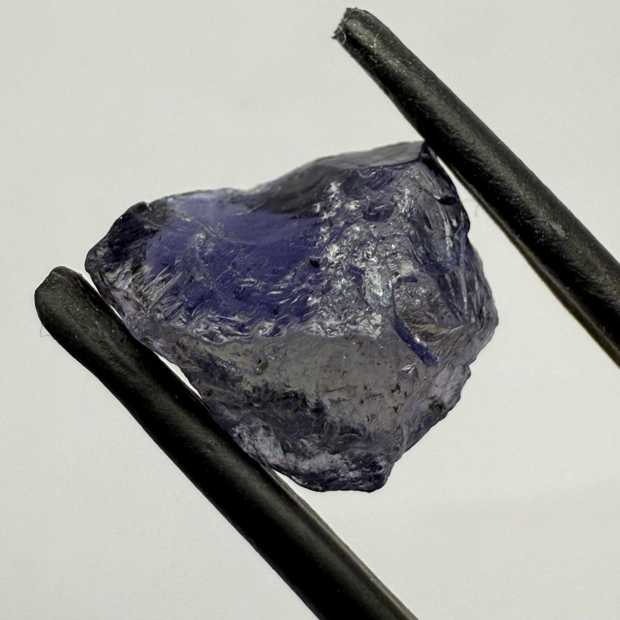 Iolite, 4.84ct, Tanzania, Untreated Unheated, slight inclusions and some white spots, has a flattish shape