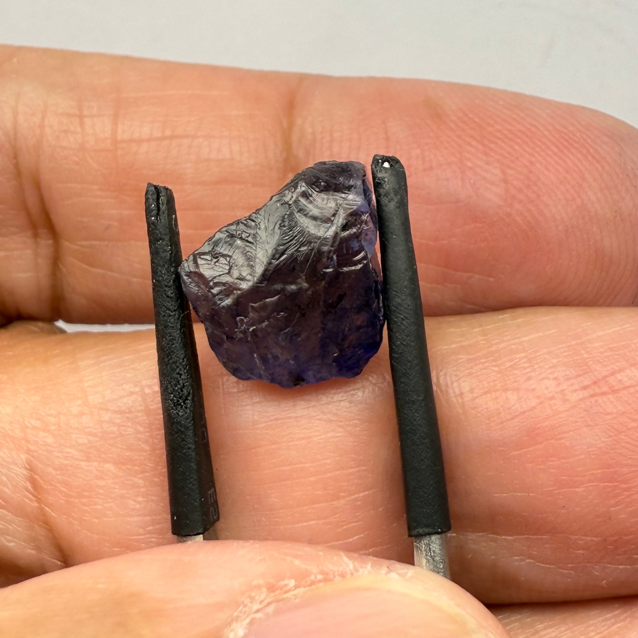 Iolite, 4.84ct, Tanzania, Untreated Unheated, slight inclusions and some white spots, has a flattish shape
