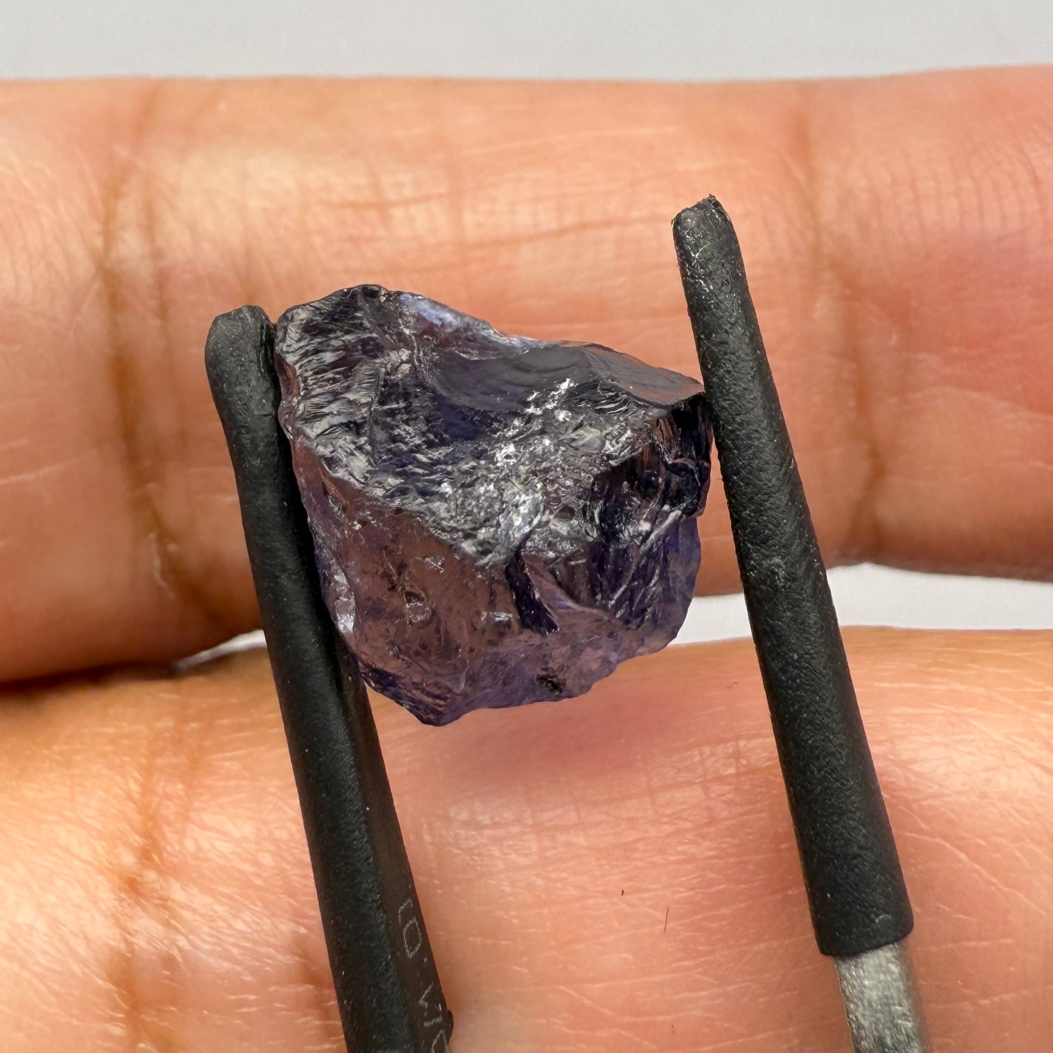 Iolite, 4.84ct, Tanzania, Untreated Unheated, slight inclusions and some white spots, has a flattish shape