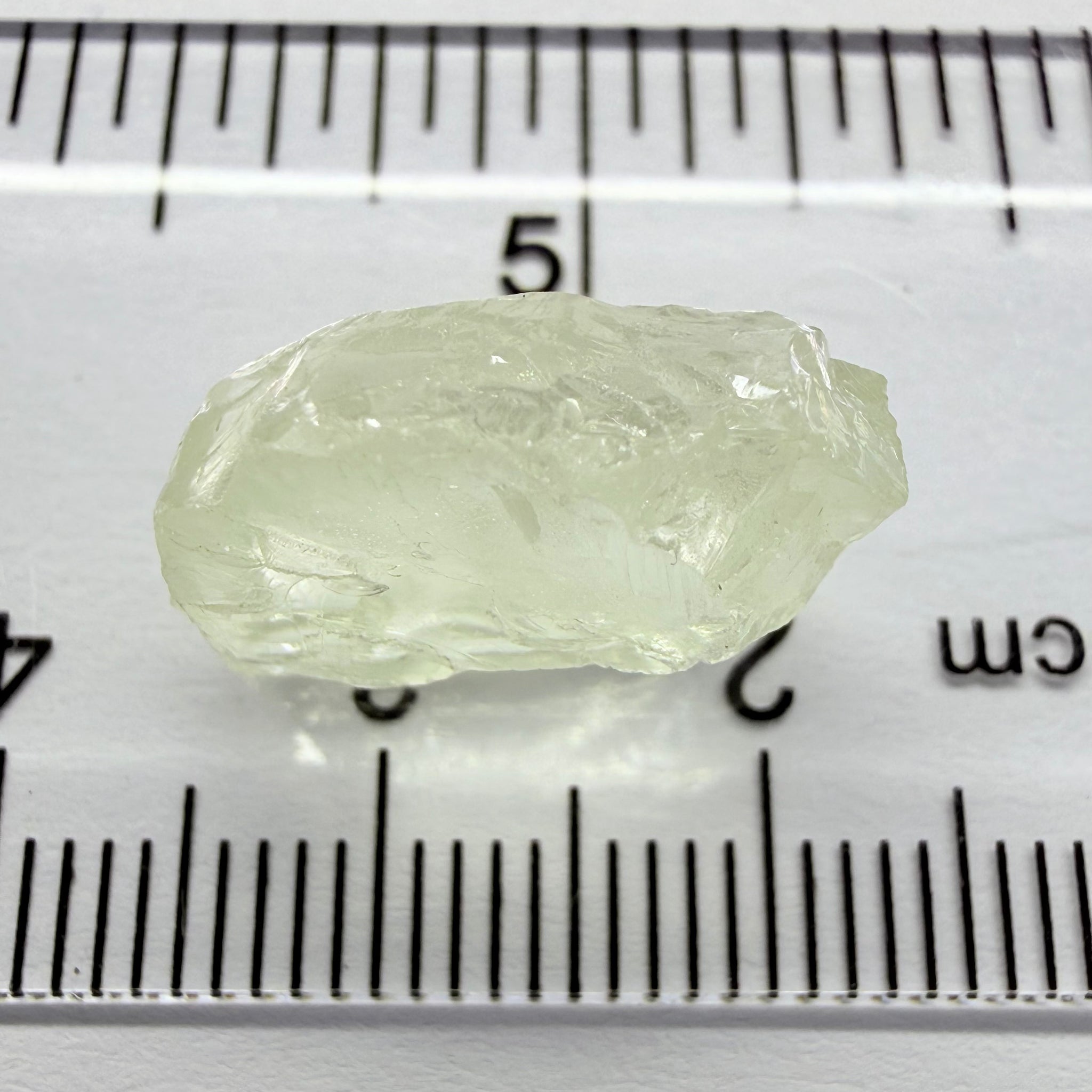 Colourless Beryl, 11.65ct, Loliondo, Tanzania, Untreated Unheated, slightly milky, flattish shape, vs