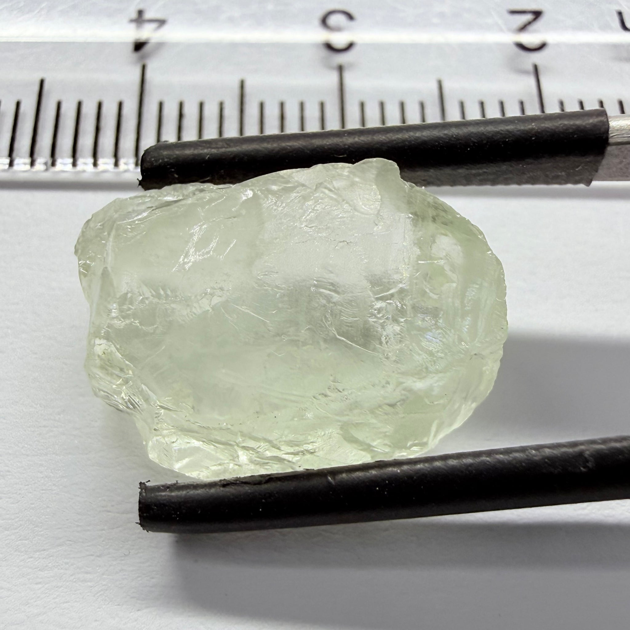 Colourless Beryl, 11.65ct, Loliondo, Tanzania, Untreated Unheated, slightly milky, flattish shape, vs