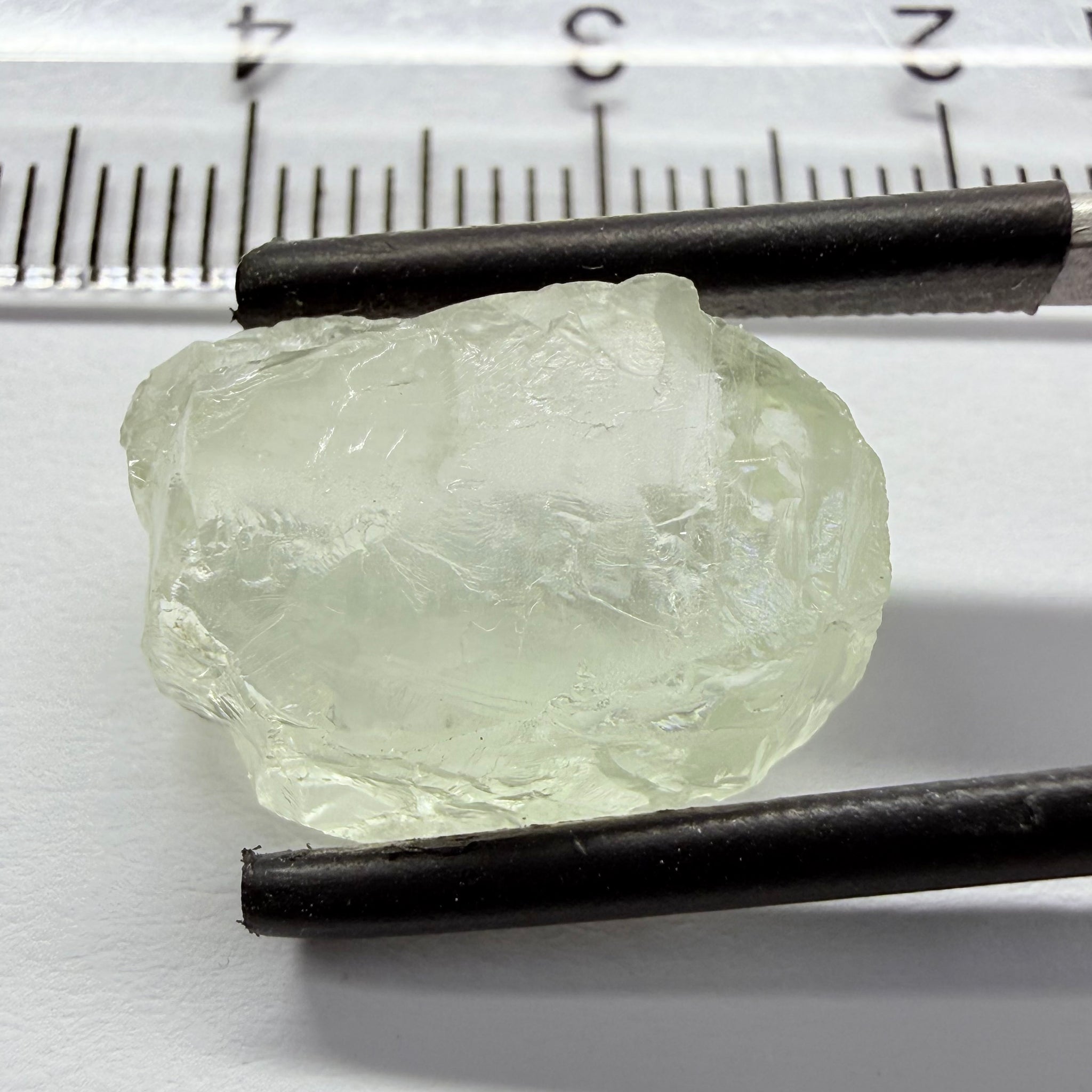 Colourless Beryl, 11.65ct, Loliondo, Tanzania, Untreated Unheated, slightly milky, flattish shape, vs